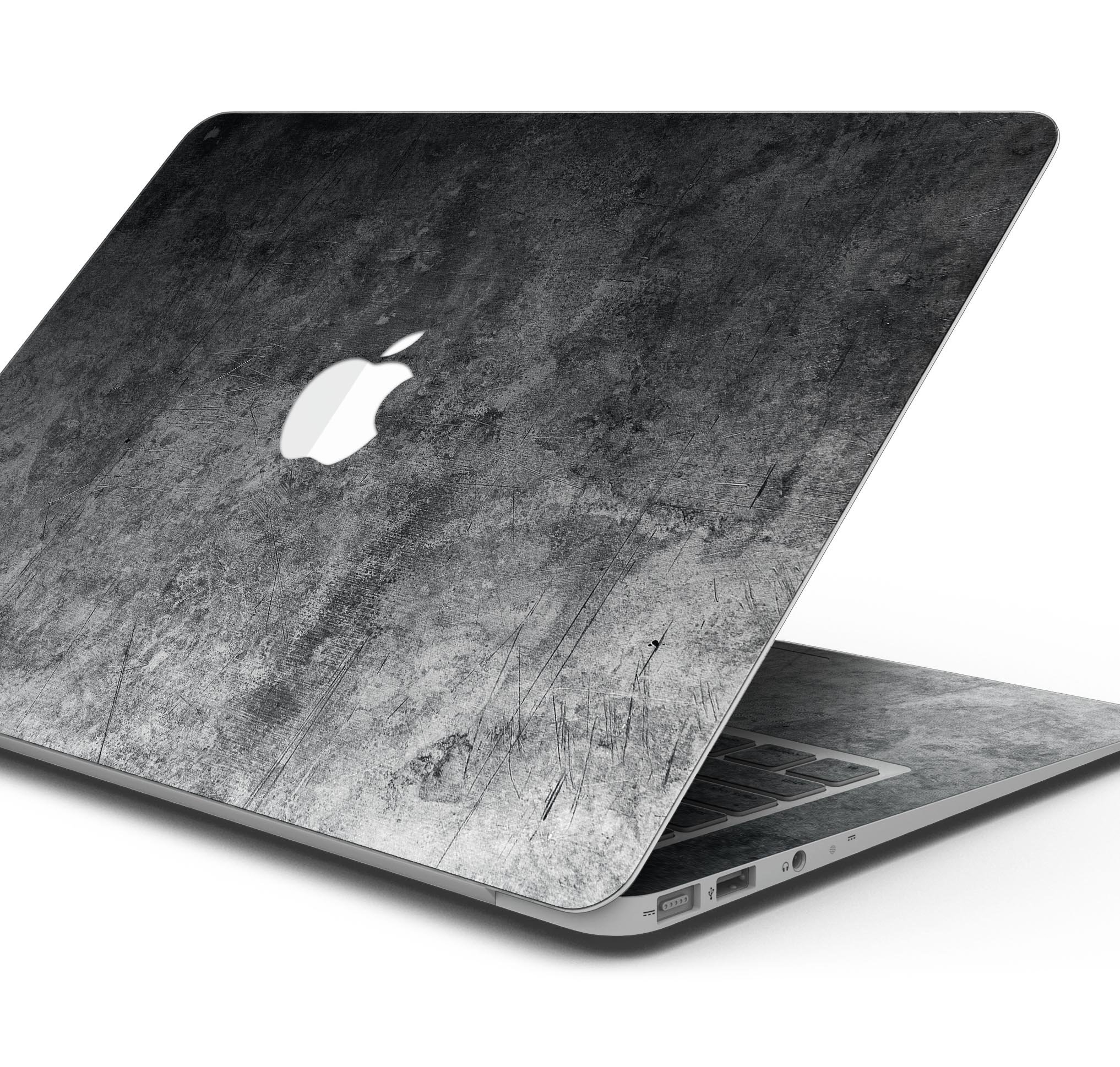 Scratched Metal Fab Skin Decal Wrap Kit for Apple MacBook, showcasing a stylish design and premium vinyl material.