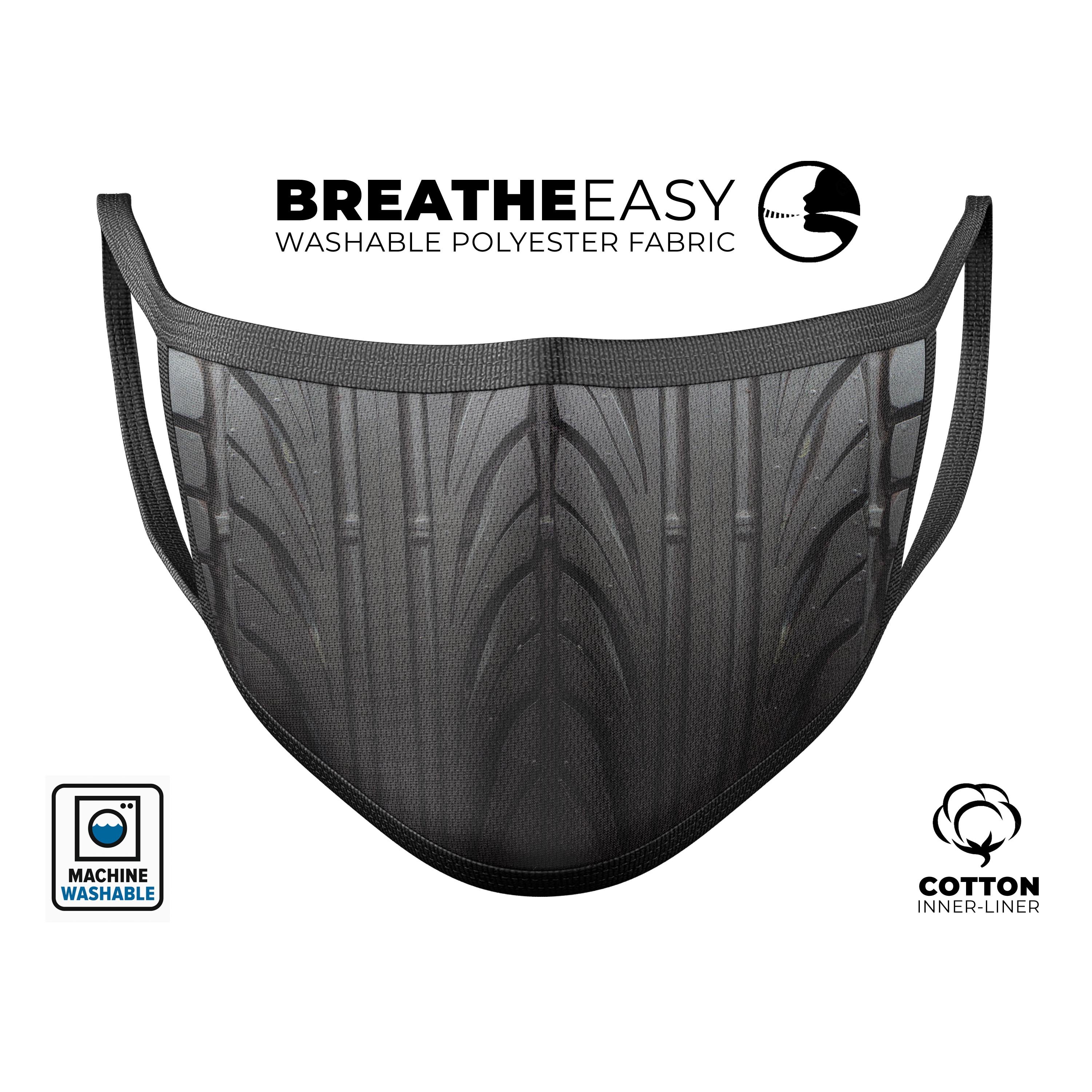 Shiny Black Tire Tread mouth cover, showcasing a stylish design with adjustable ear-loops for a comfortable fit.