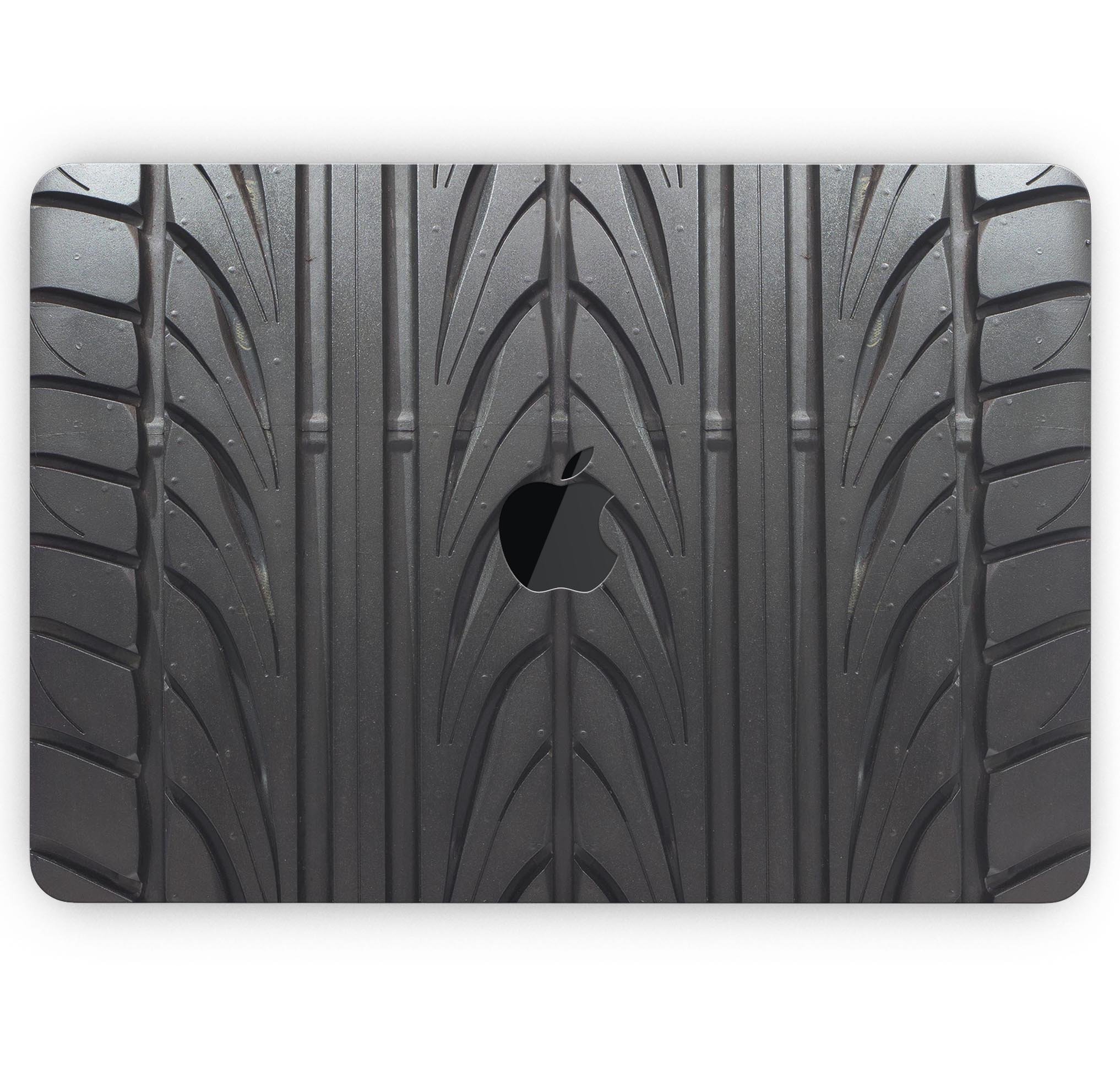 Close-up tire tread with Apple logo
