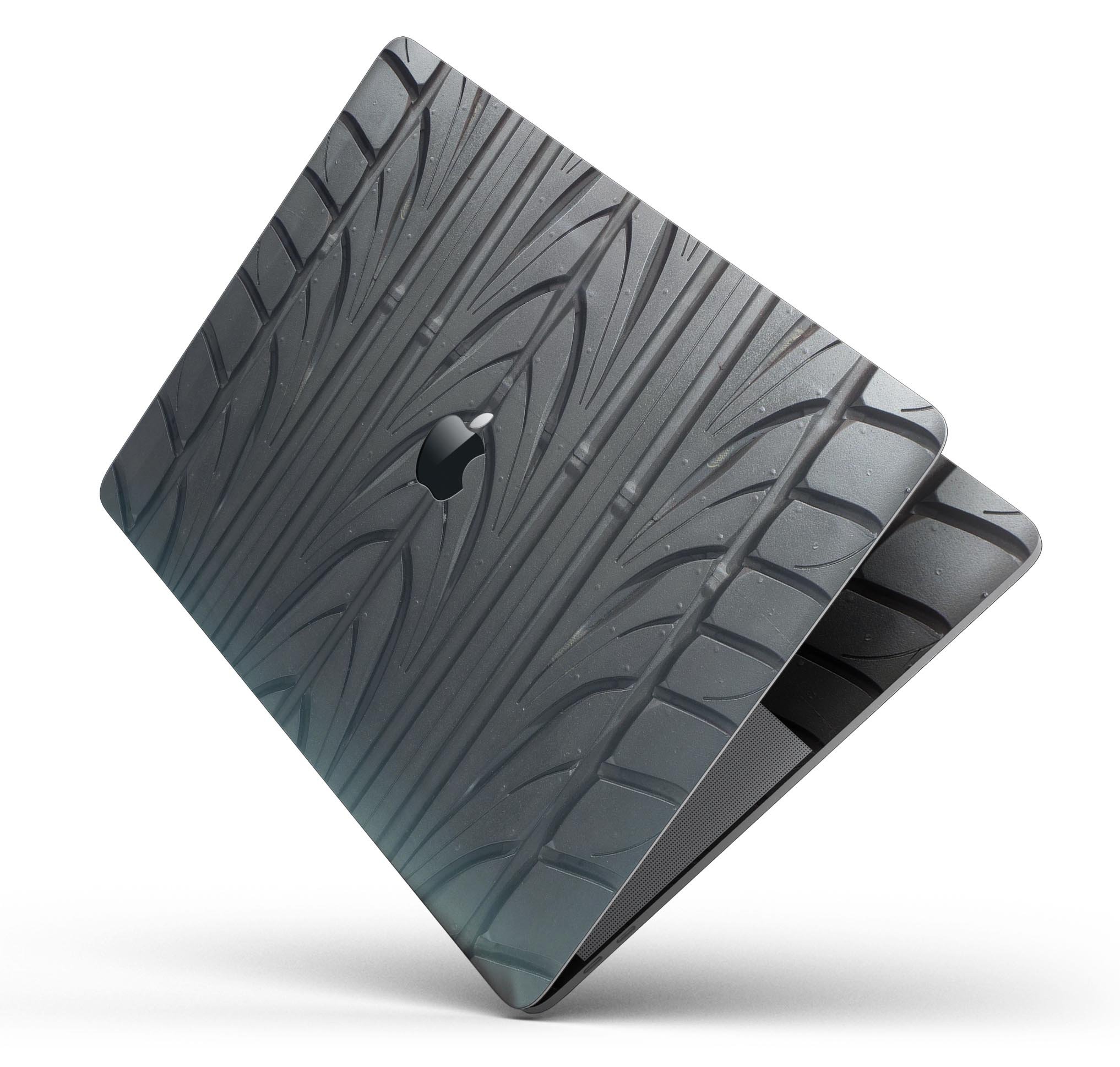 Apple laptop with tire tread.