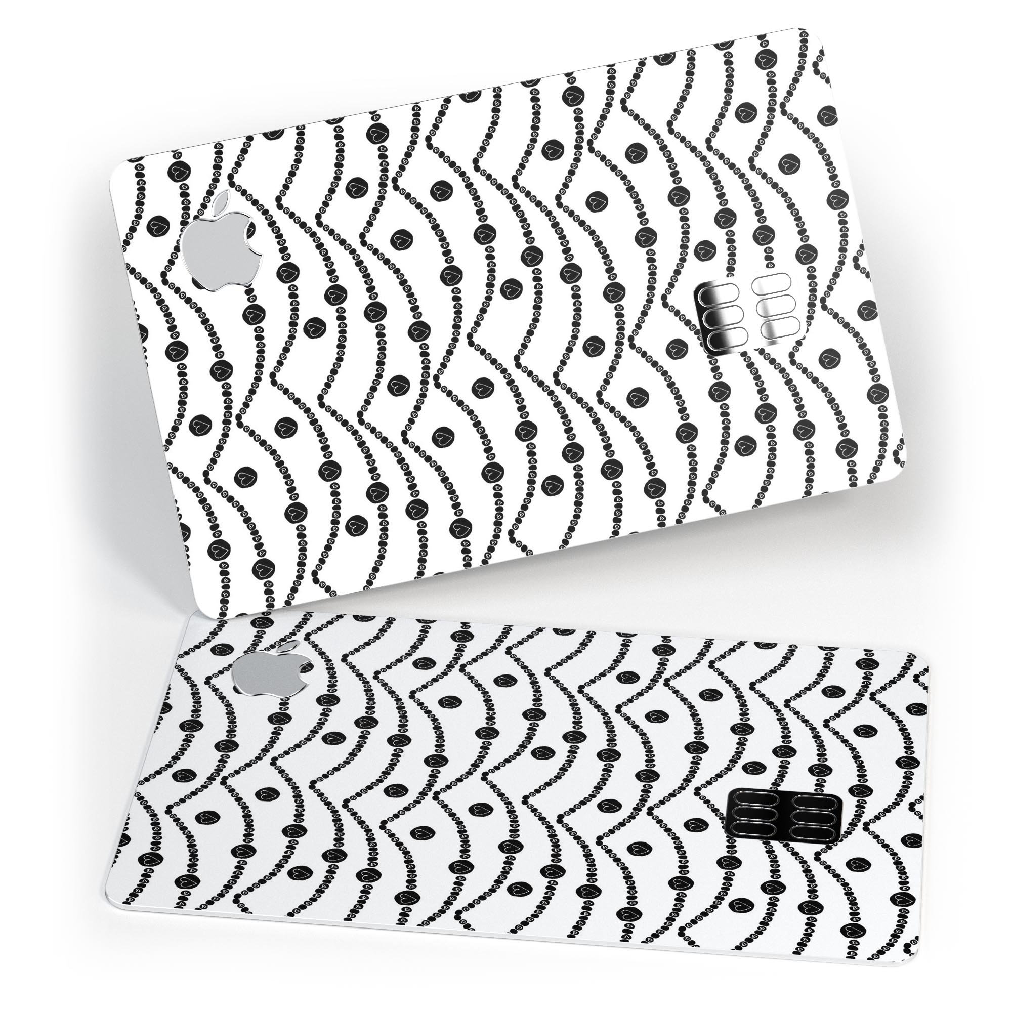 Slate Black Tiny Hearts decal on an Apple Card, showcasing a stylish design with tiny hearts on powerlines.