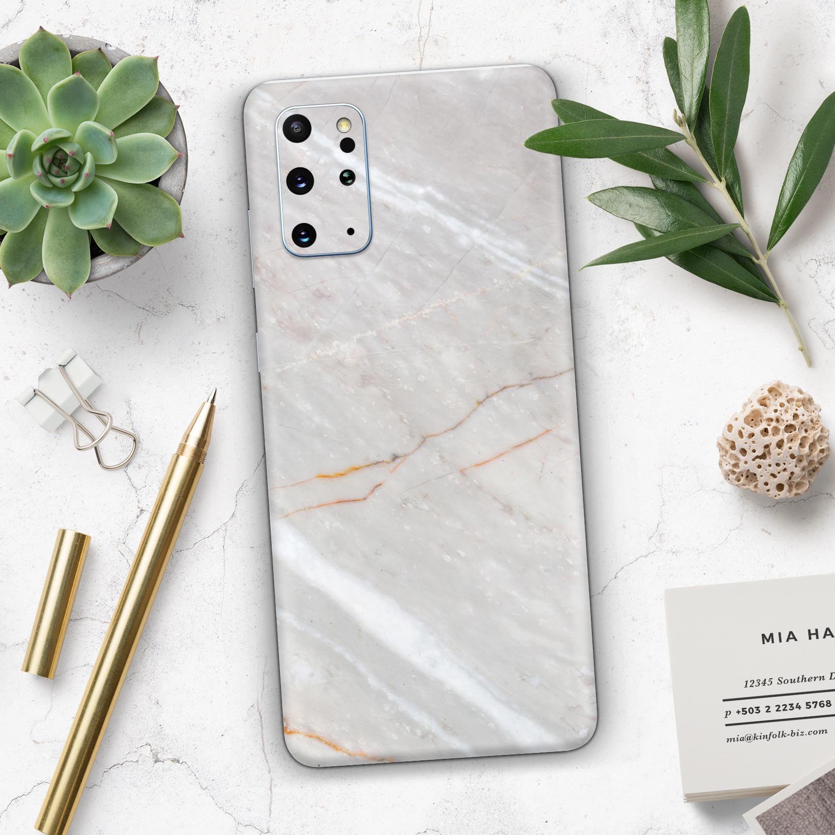 Slate Marble Surface V8 Skin-Kit for Samsung Galaxy S-Series, showcasing a stylish marble design on a smartphone.