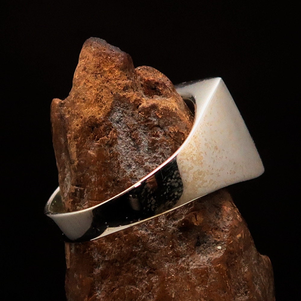 A square-shaped sterling silver ring featuring the vibrant Slovakian flag, polished to a mirror finish.