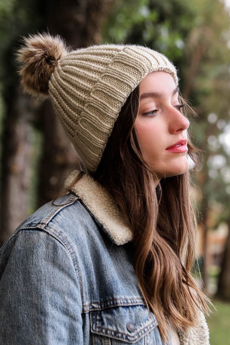 Soft Rib Knit Pom Beanie in a stylish ribbed design with a fluffy pom on top, perfect for winter wear.