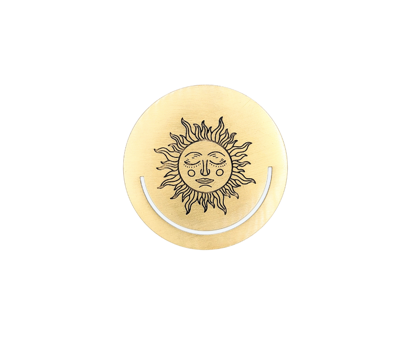 Solar Radiance Bookmark made of unpolished brass, featuring a circular design, perfect for marking pages in books or planners.