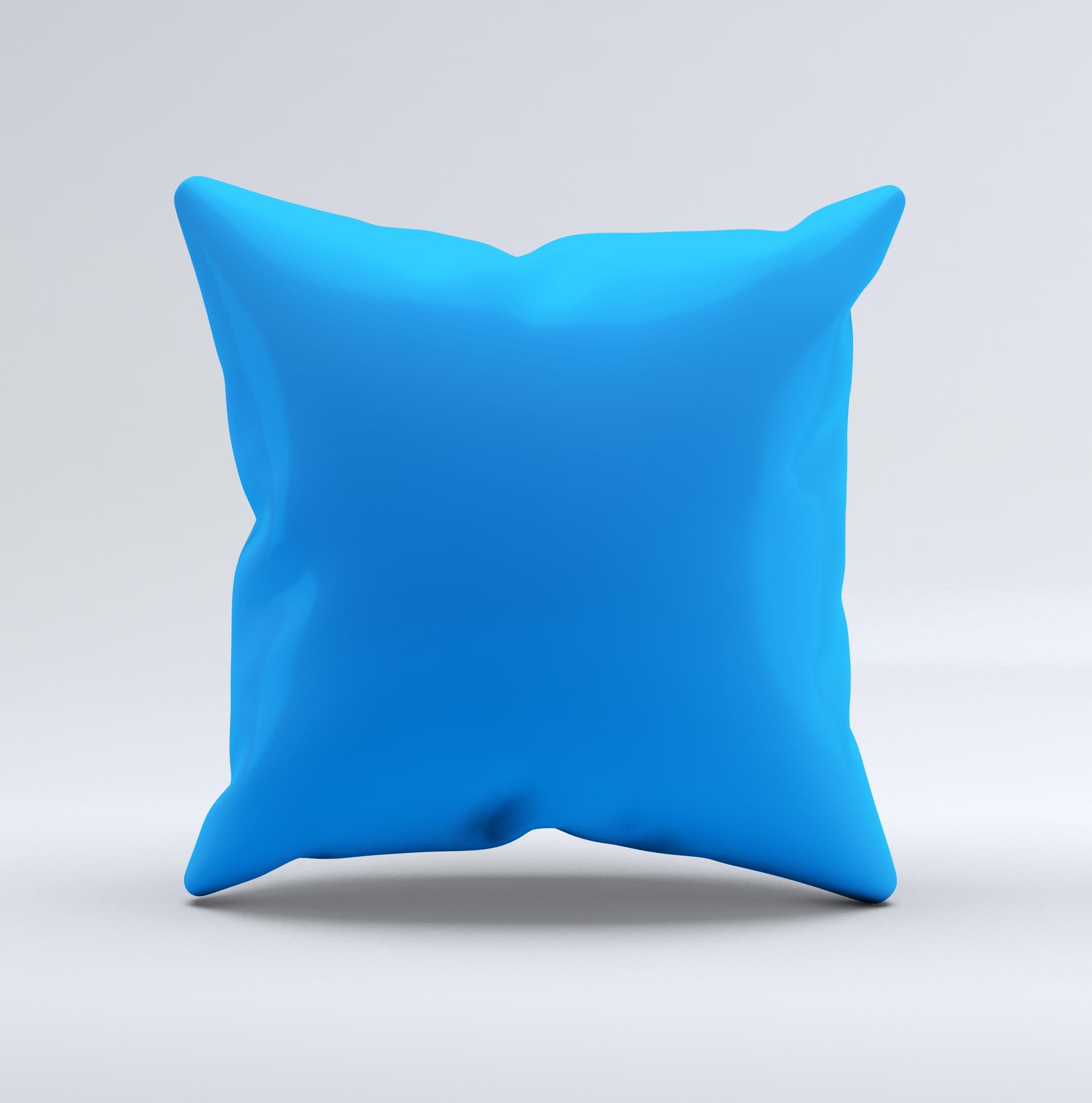 Solid blue decorative throw pillow with unique ink-fuzed design, handcrafted in Virginia, showcasing high-quality fabric and filling.