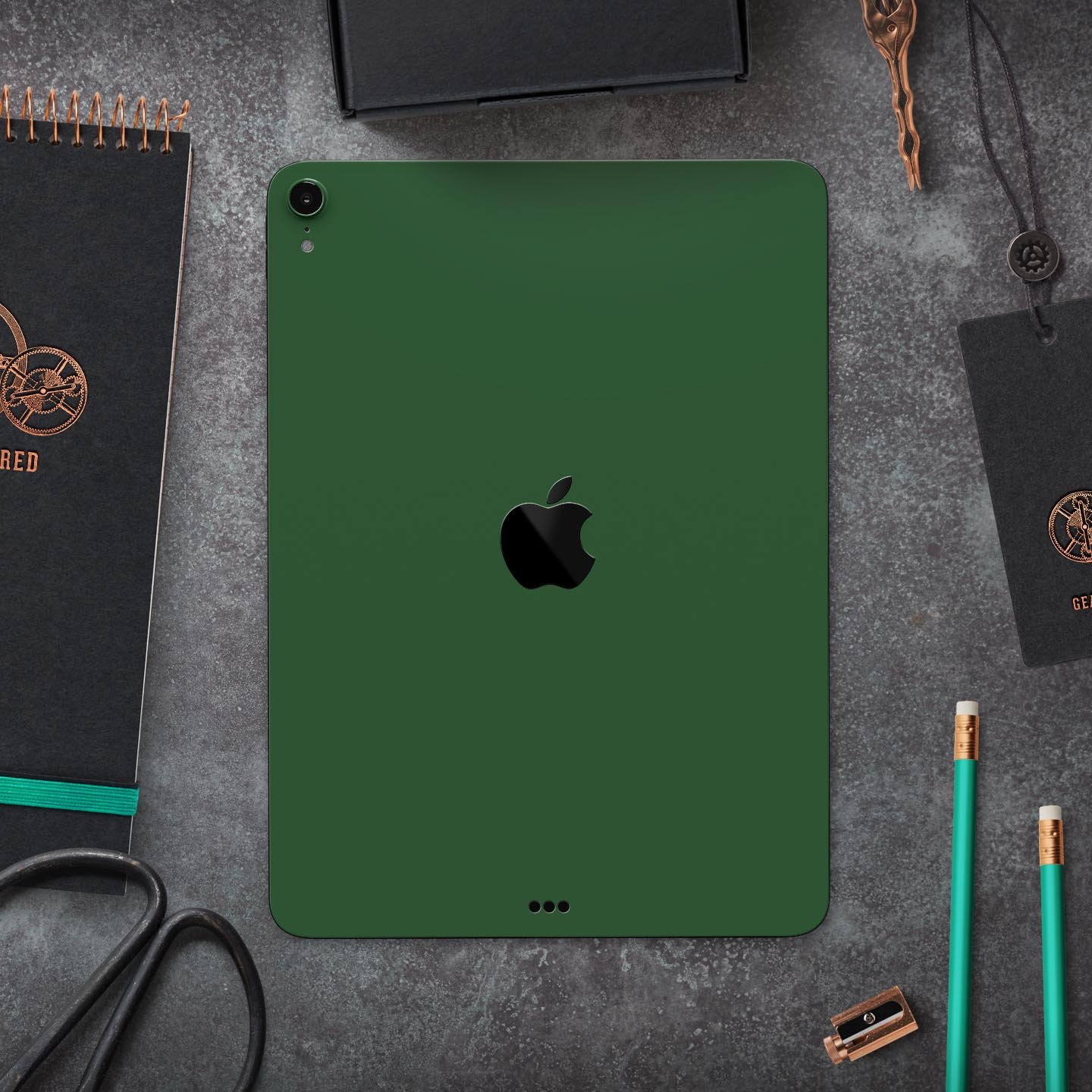 Solid Hunter Green full body skin decal for Apple iPad Pro, showcasing its sleek design and premium 3M material.