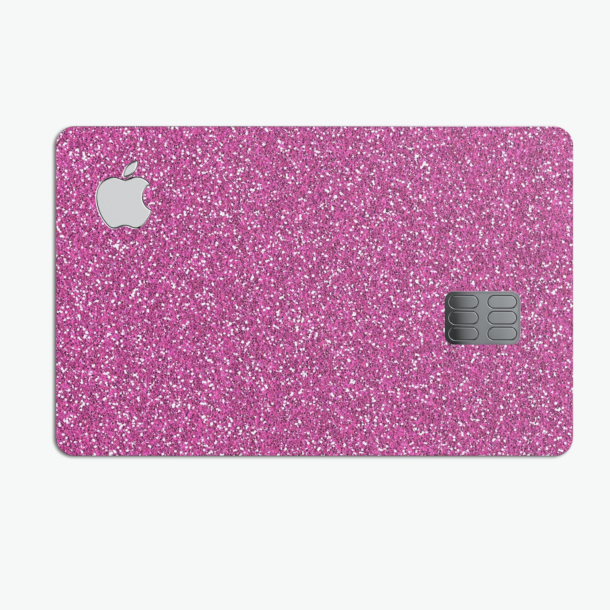 Sparkling Pink Ultra Metallic Glitter decal on an Apple Card, showcasing its vibrant color and protective features.