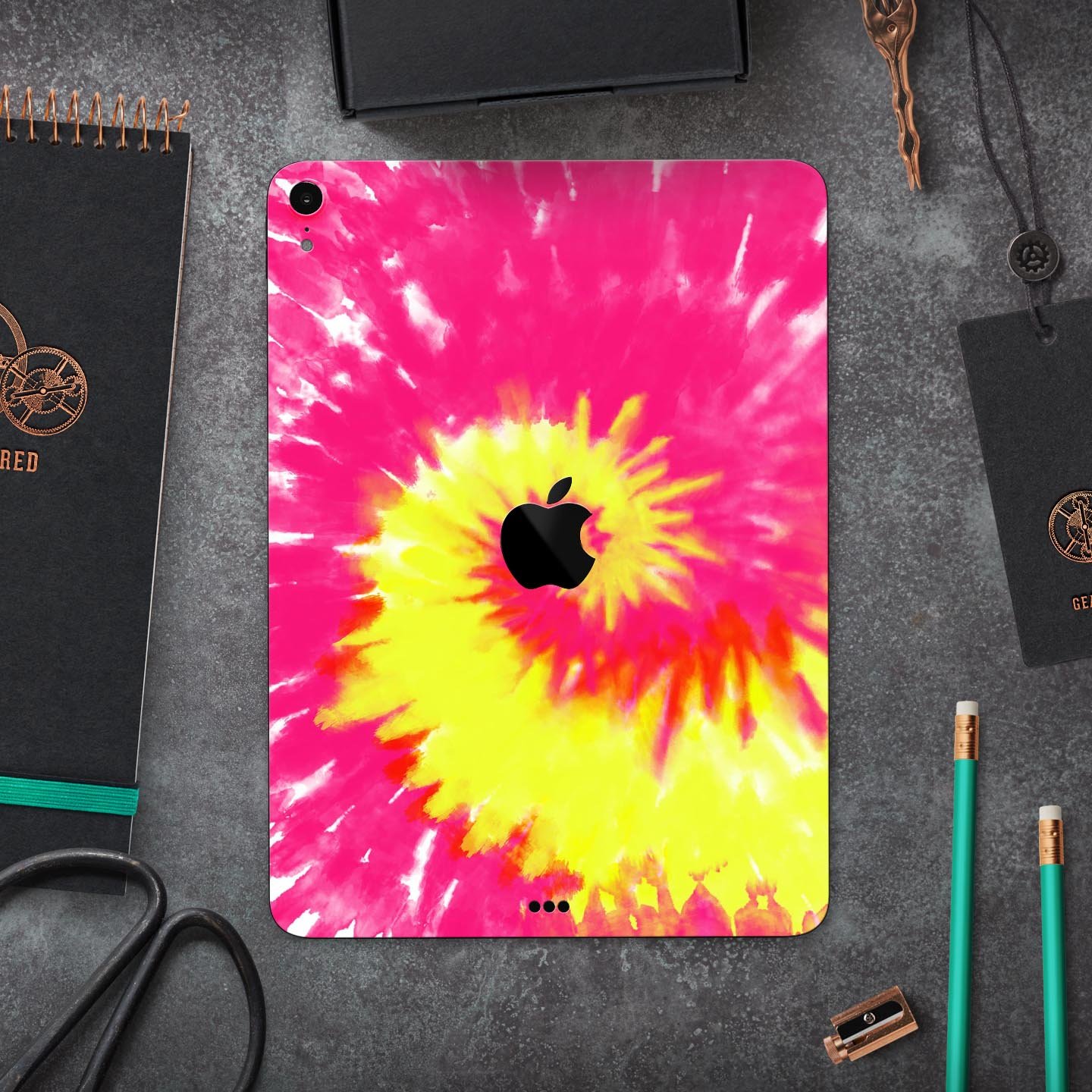 Spiral Tie Dye V2 Full Body Skin Decal for Apple iPad Pro 12.9, showcasing vibrant colors and a sleek design.