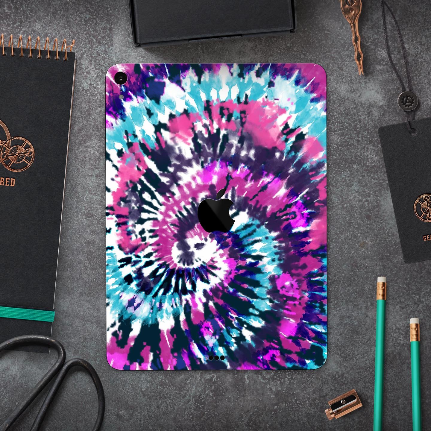 Spiral Tie Dye V3 skin decal for Apple iPad Pro 12.9", showcasing vibrant colors and a sleek design.