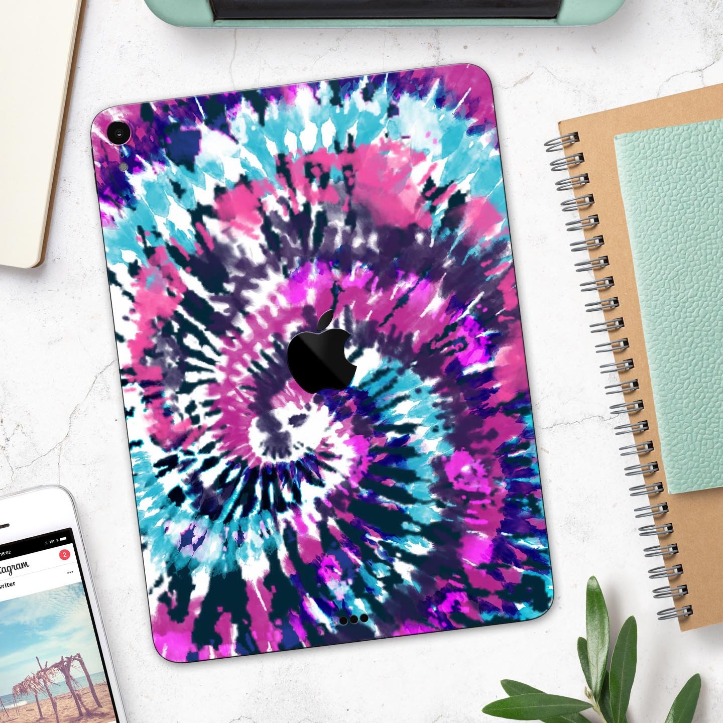 Spiral Tie Dye V3 skin decal for Apple iPad Pro 12.9", showcasing vibrant colors and a sleek design.