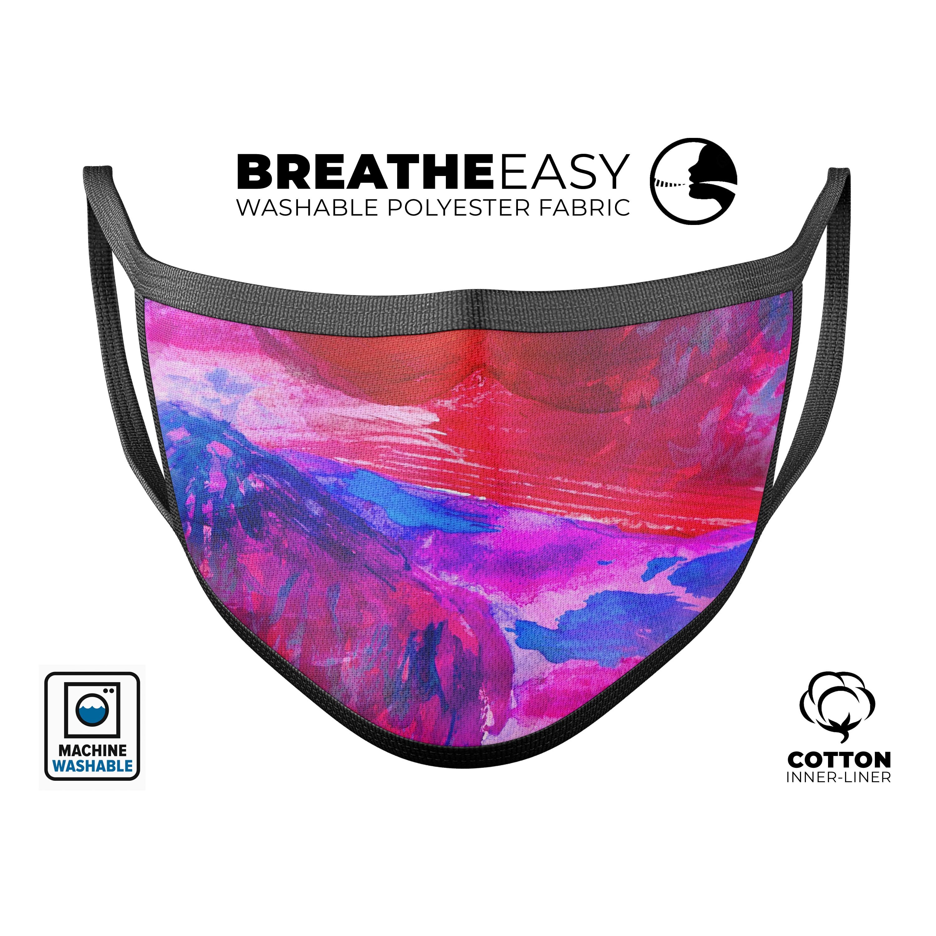 Splatter Blue and Red Oil face mask, featuring a vibrant design, adjustable ear-loops, and a comfortable cotton interior.