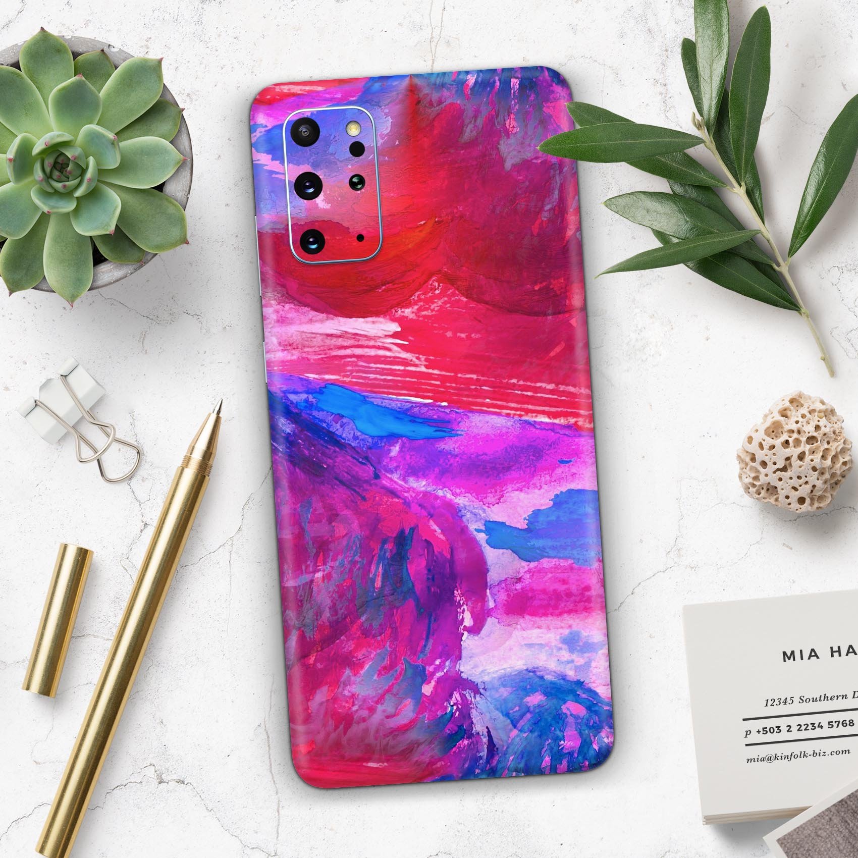 Splatter Blue and Red Oil Skin-Kit for Samsung Galaxy S-Series, showcasing vibrant colors and a sleek design.