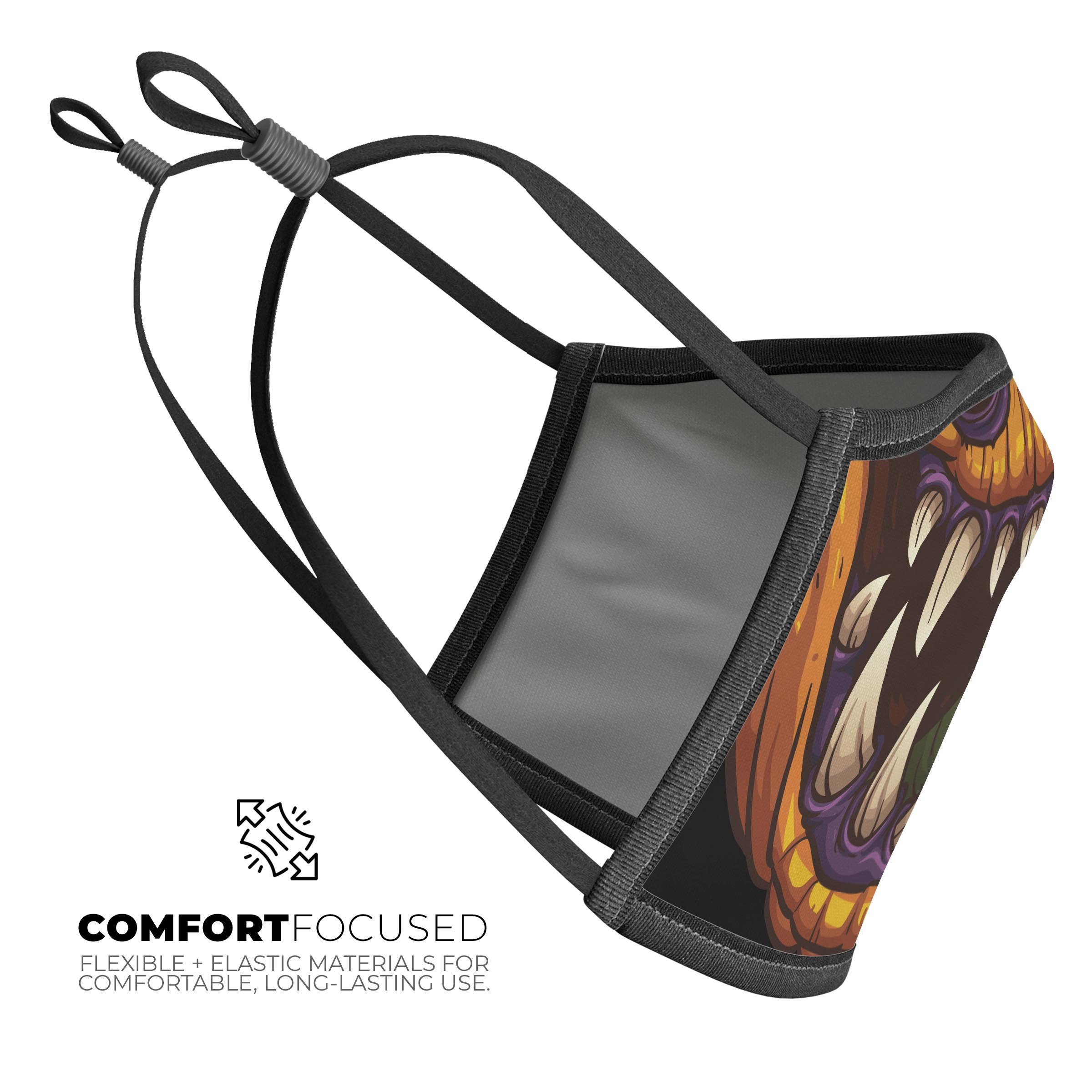 Spooky Pumpkin Monster V1 mouth cover featuring a vibrant Halloween design, adjustable ear loops, and a soft cotton interior.