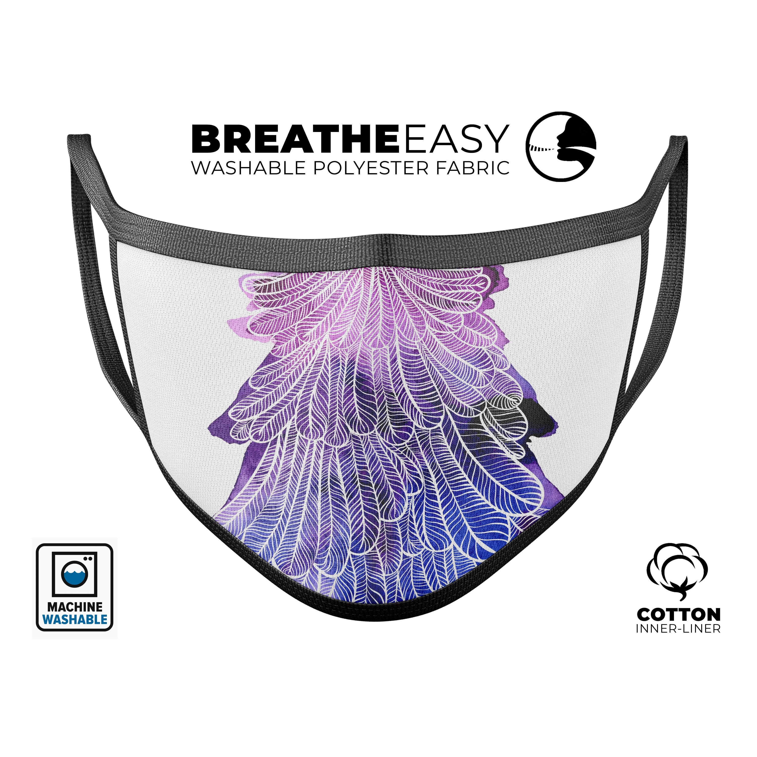 Stenciled Watercolor Evergreen Tree face mask, showcasing vibrant colors and adjustable ear loops for a comfortable fit.