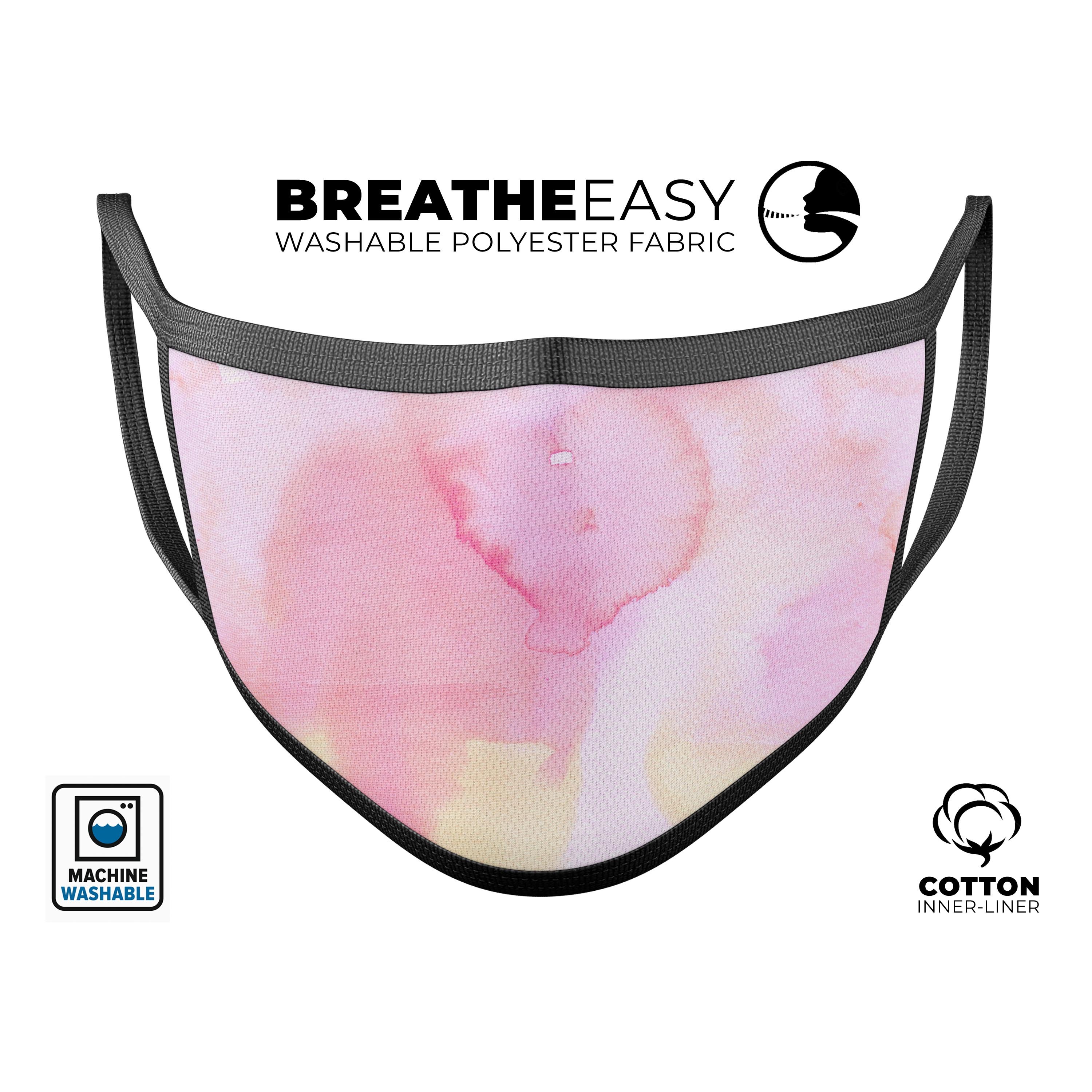 Subtle Pink Absorbed Watercolor Texture reusable mouth cover, showcasing a vibrant design and adjustable ear loops.