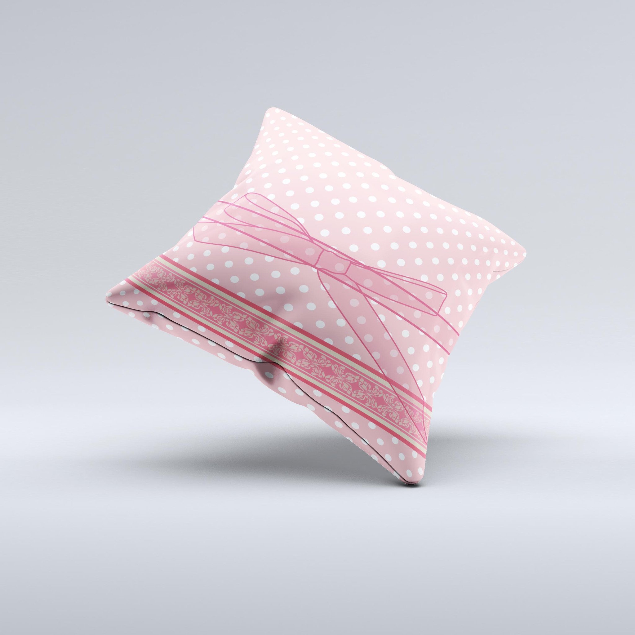 A charming Subtle Pink Polka Dot Decorative Throw Pillow with a stylish ribbon, showcasing its unique handmade quality and soft fabric.