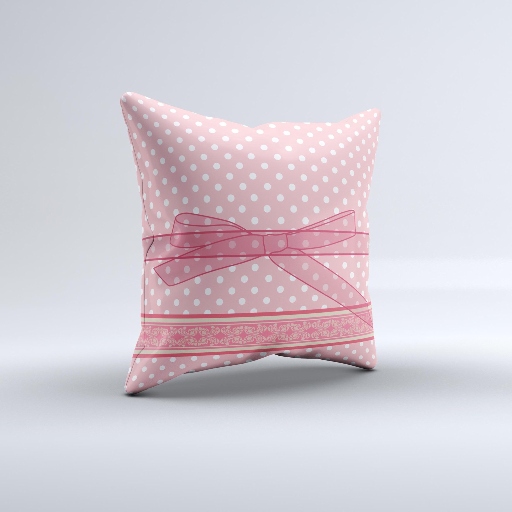 A charming Subtle Pink Polka Dot Decorative Throw Pillow with a stylish ribbon, showcasing its unique handmade quality and soft fabric.