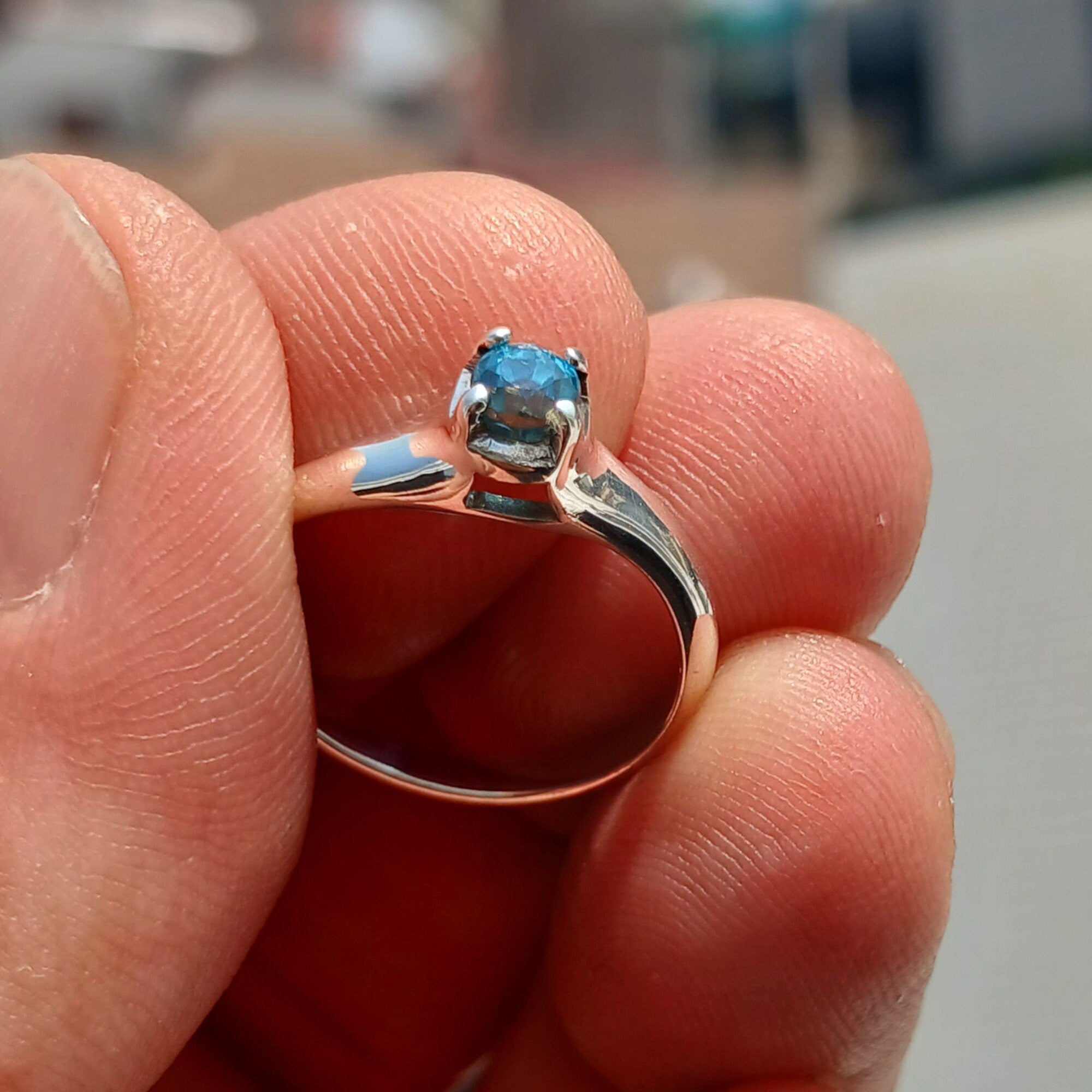Sweet Blue Zircon Ring in sterling silver featuring an oval cut blue zircon gemstone, elegantly designed for sophistication.