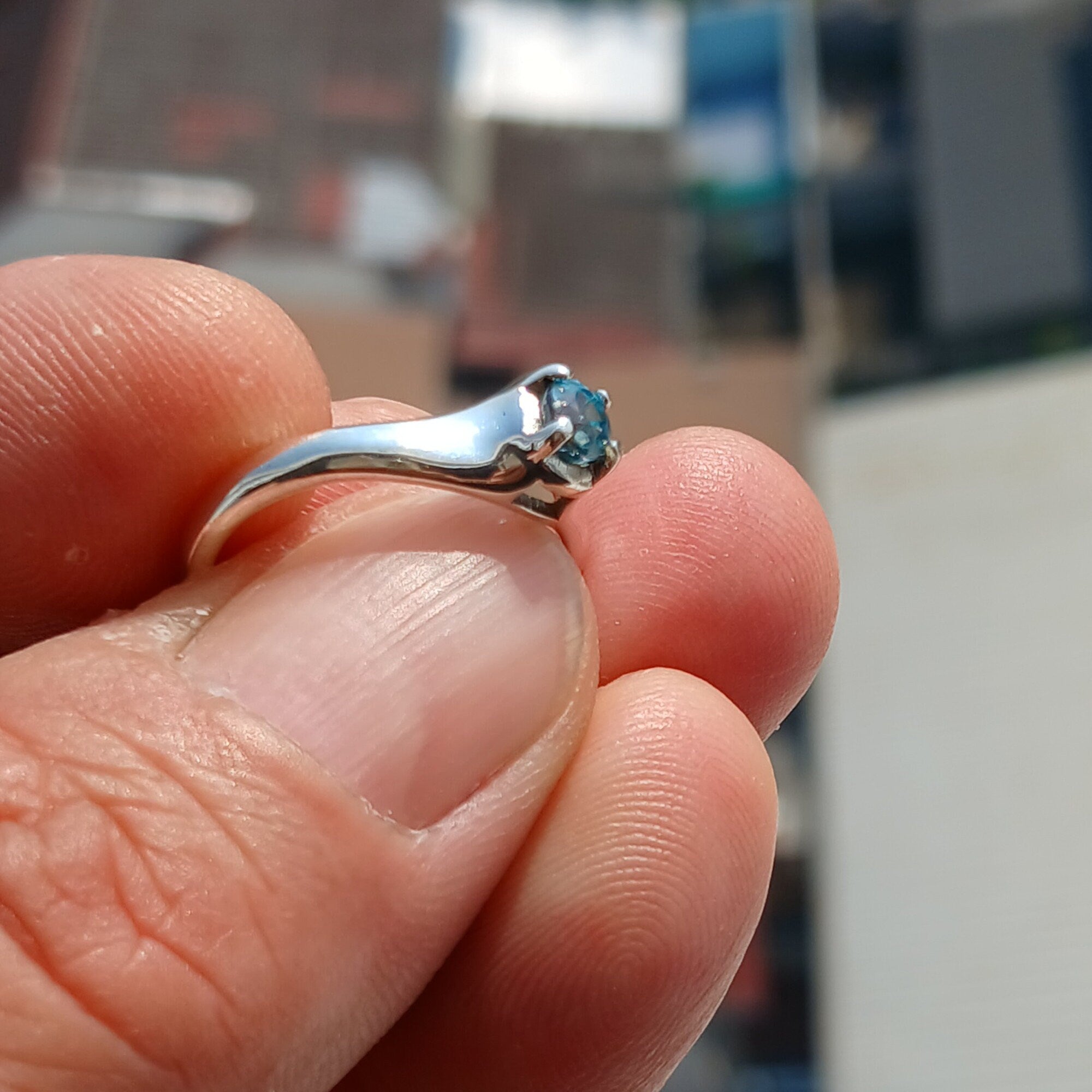 Sweet Blue Zircon Ring in sterling silver featuring an oval cut blue zircon gemstone, elegantly designed for sophistication.