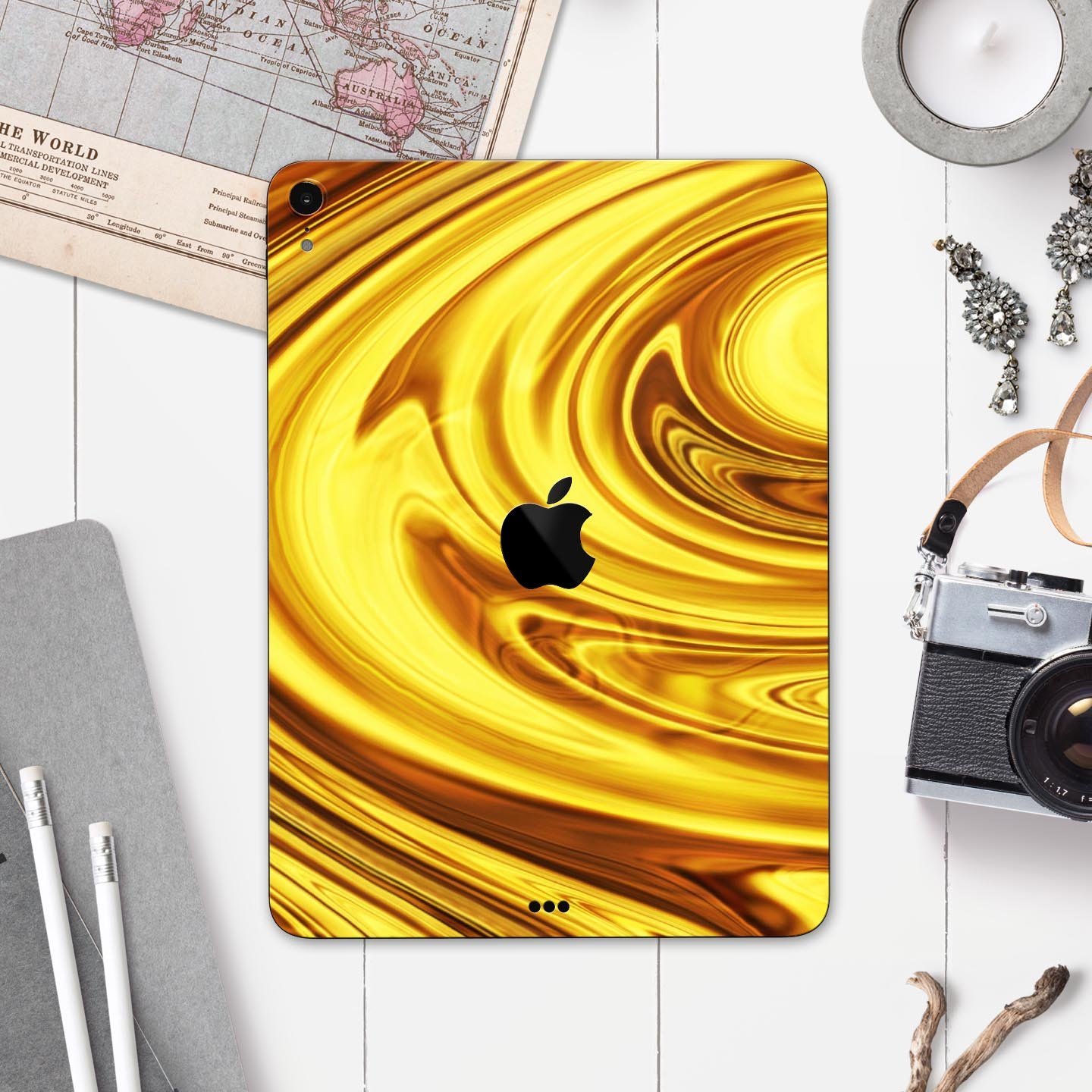 Swirling Liquid Gold Full Body Skin Decal for Apple iPad Pro, showcasing a luxurious gold design with a glossy finish.