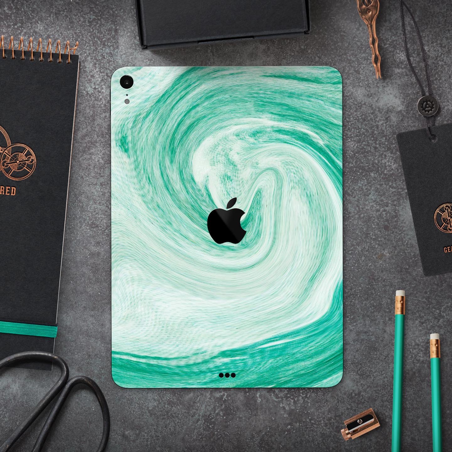 Swirling Mint Acrylic Marble skin decal for Apple iPad, showcasing a vibrant mint design with a glossy finish.
