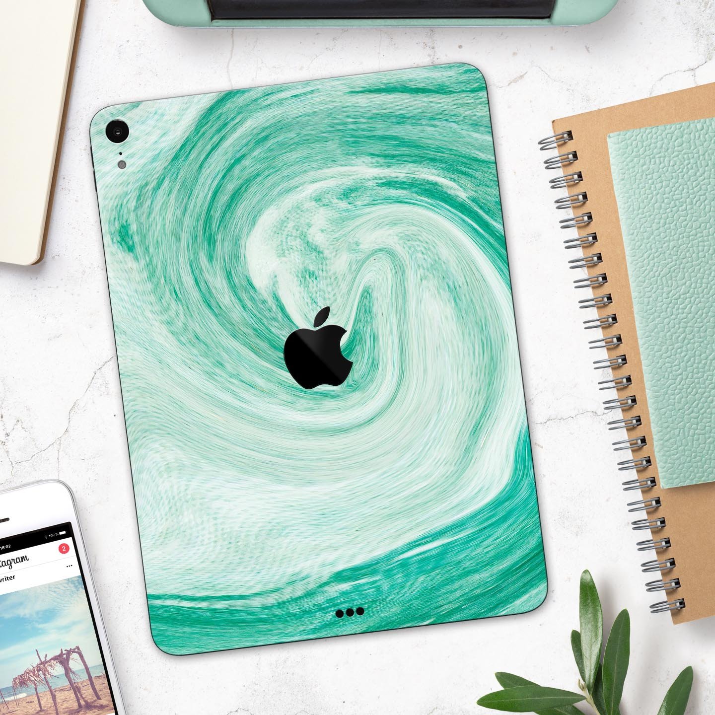 Swirling Mint Acrylic Marble skin decal for Apple iPad, showcasing a vibrant mint design with a glossy finish.