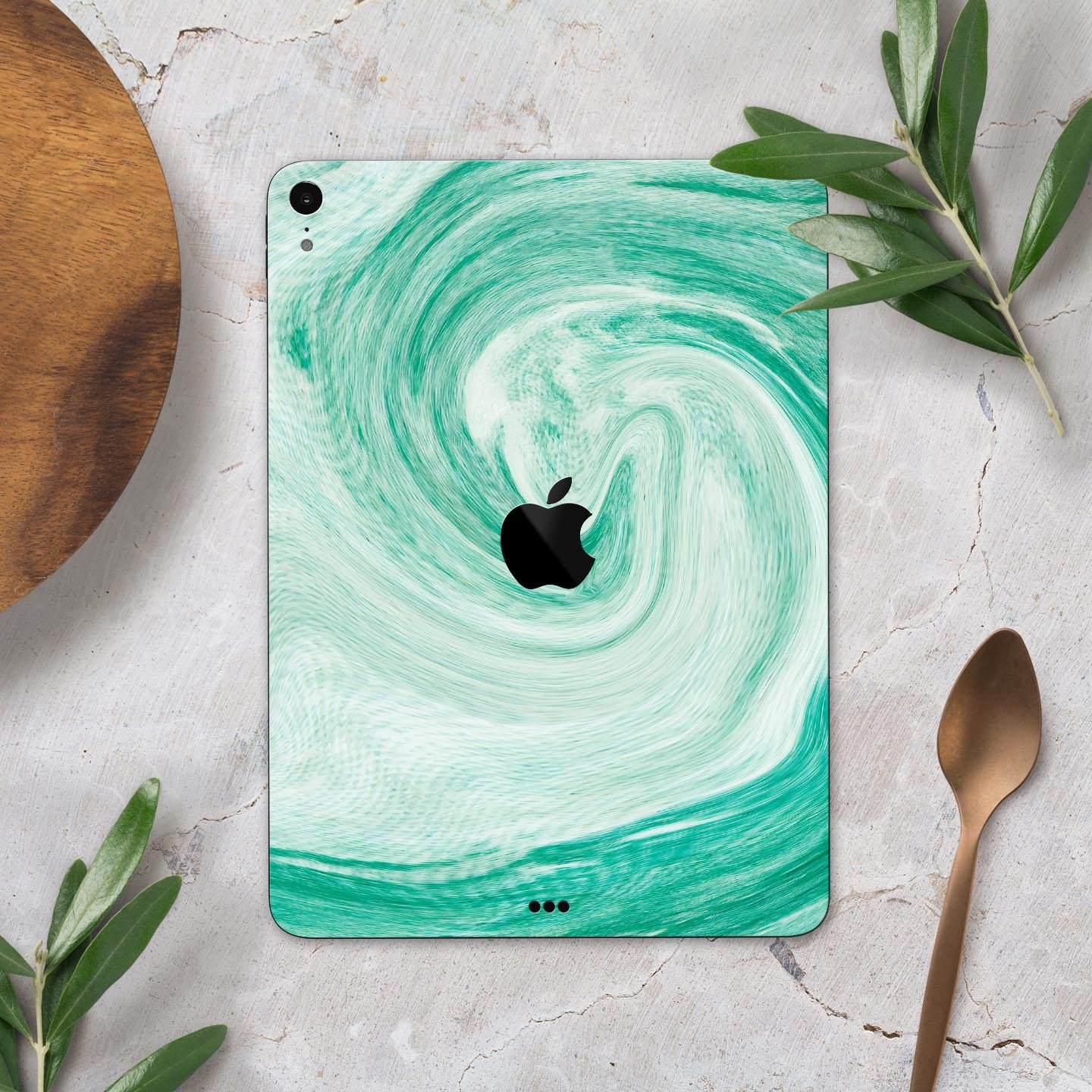 Swirling Mint Acrylic Marble skin decal for Apple iPad, showcasing a vibrant mint design with a glossy finish.