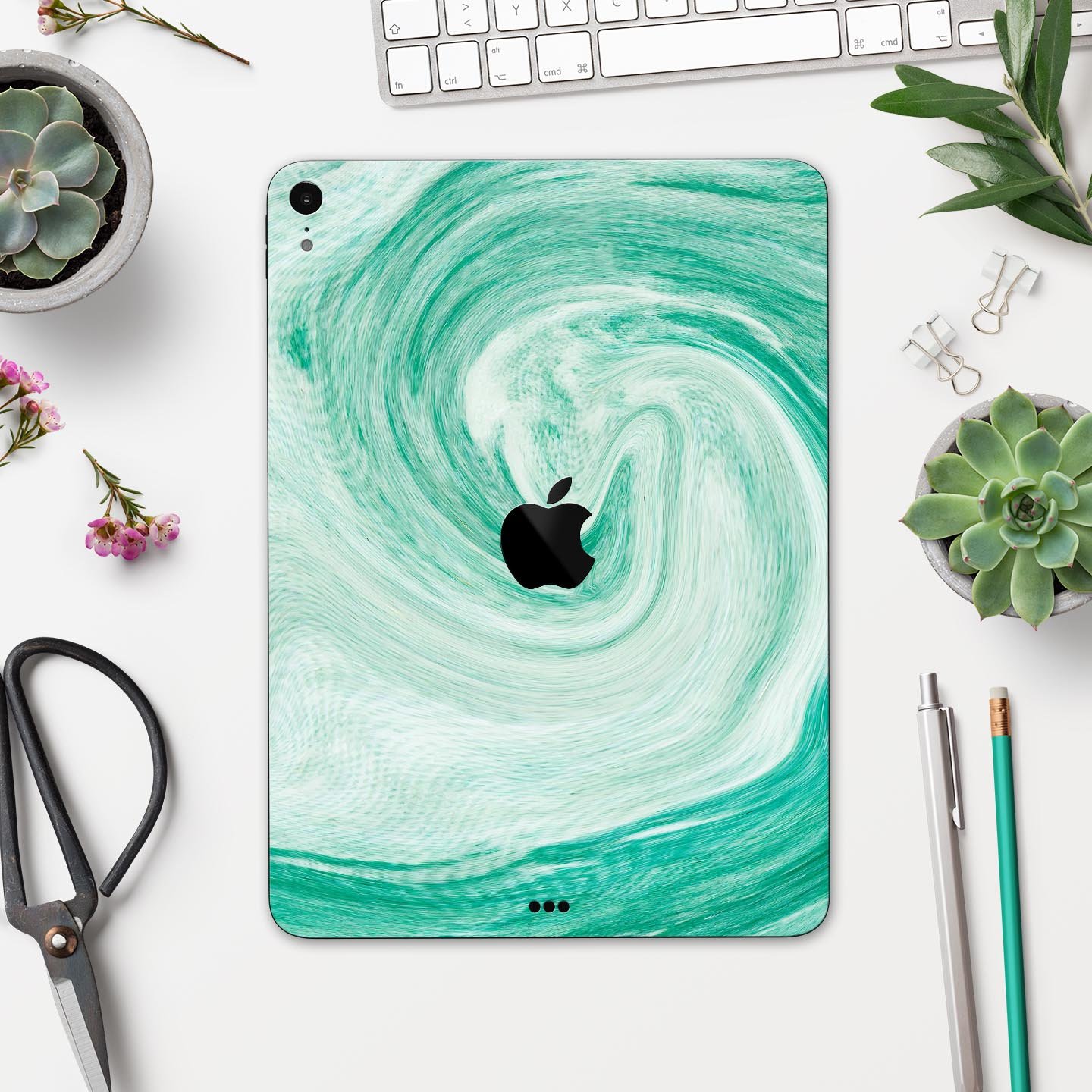 Swirling Mint Acrylic Marble skin decal for Apple iPad, showcasing a vibrant mint design with a glossy finish.
