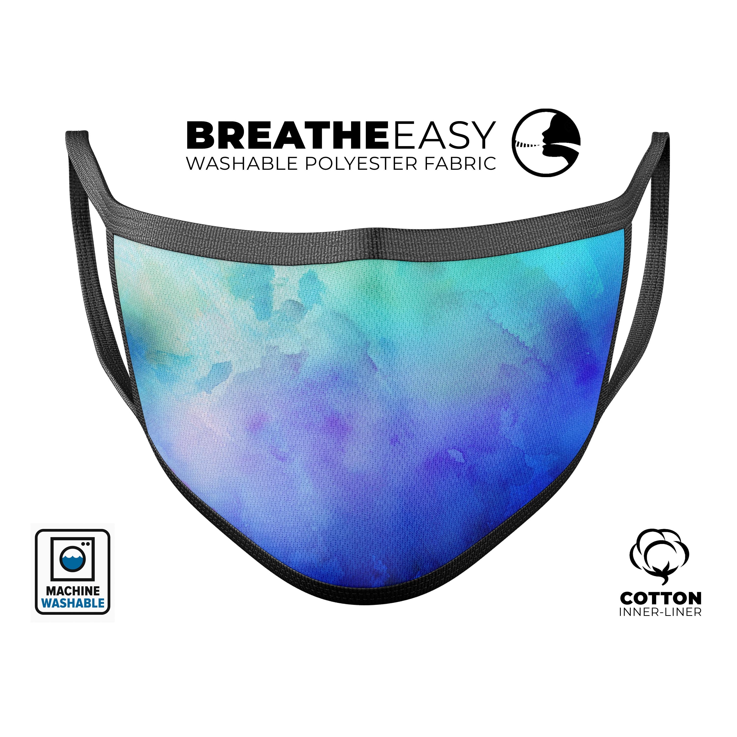 Teal 424 Absorbed Watercolor Texture face mask, showcasing vibrant colors and adjustable ear loops for a comfortable fit.