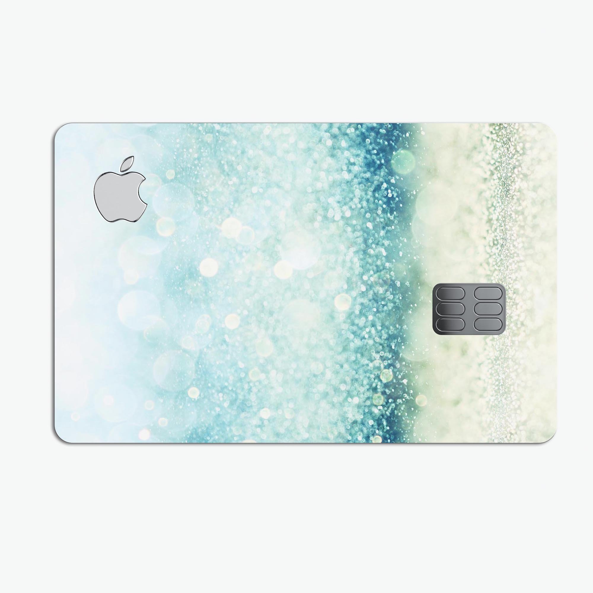 Teal and Aqua Unfocused Sparkling Orbs decal on an Apple Card, showcasing vibrant colors and a protective finish.