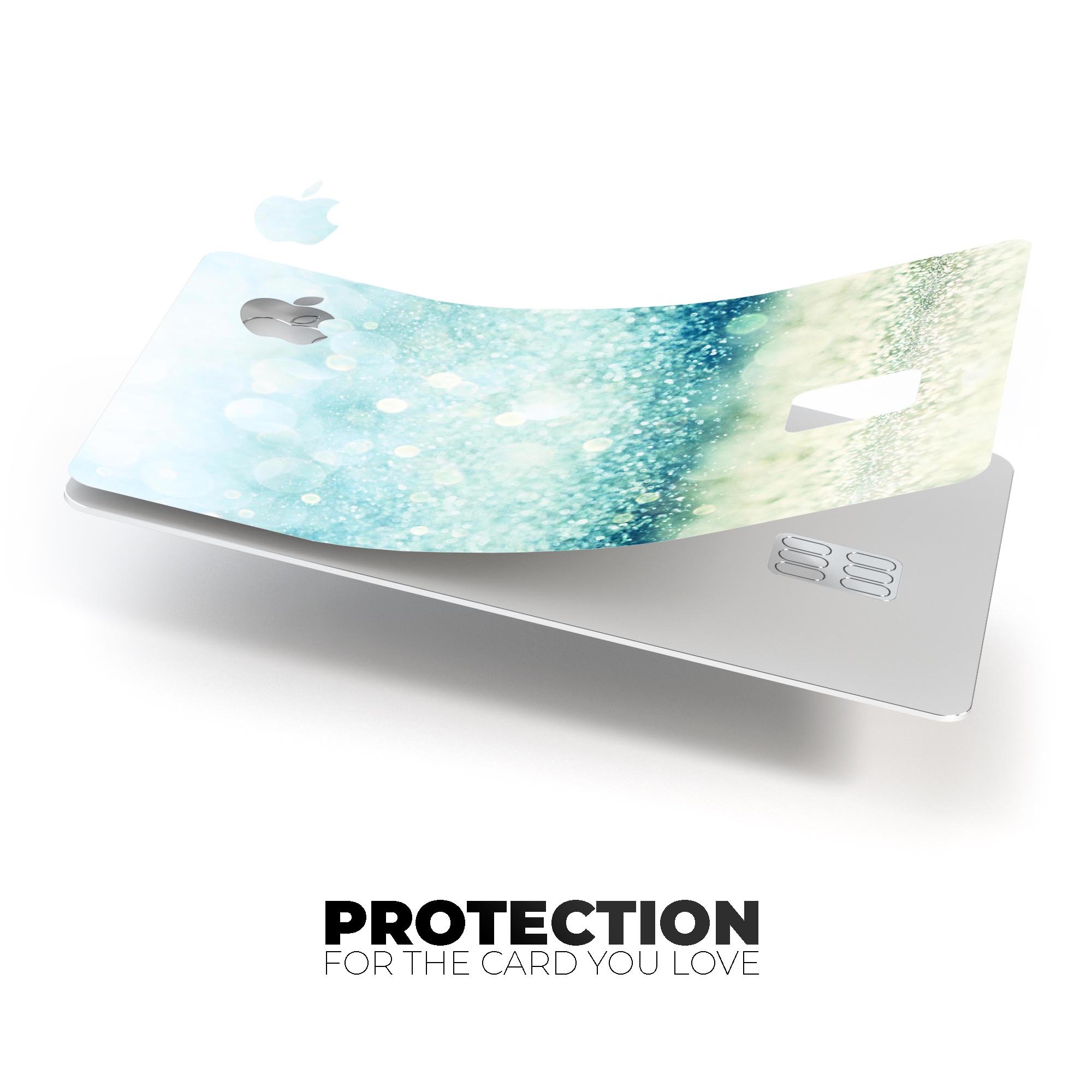 Teal and Aqua Unfocused Sparkling Orbs decal on an Apple Card, showcasing vibrant colors and a protective finish.