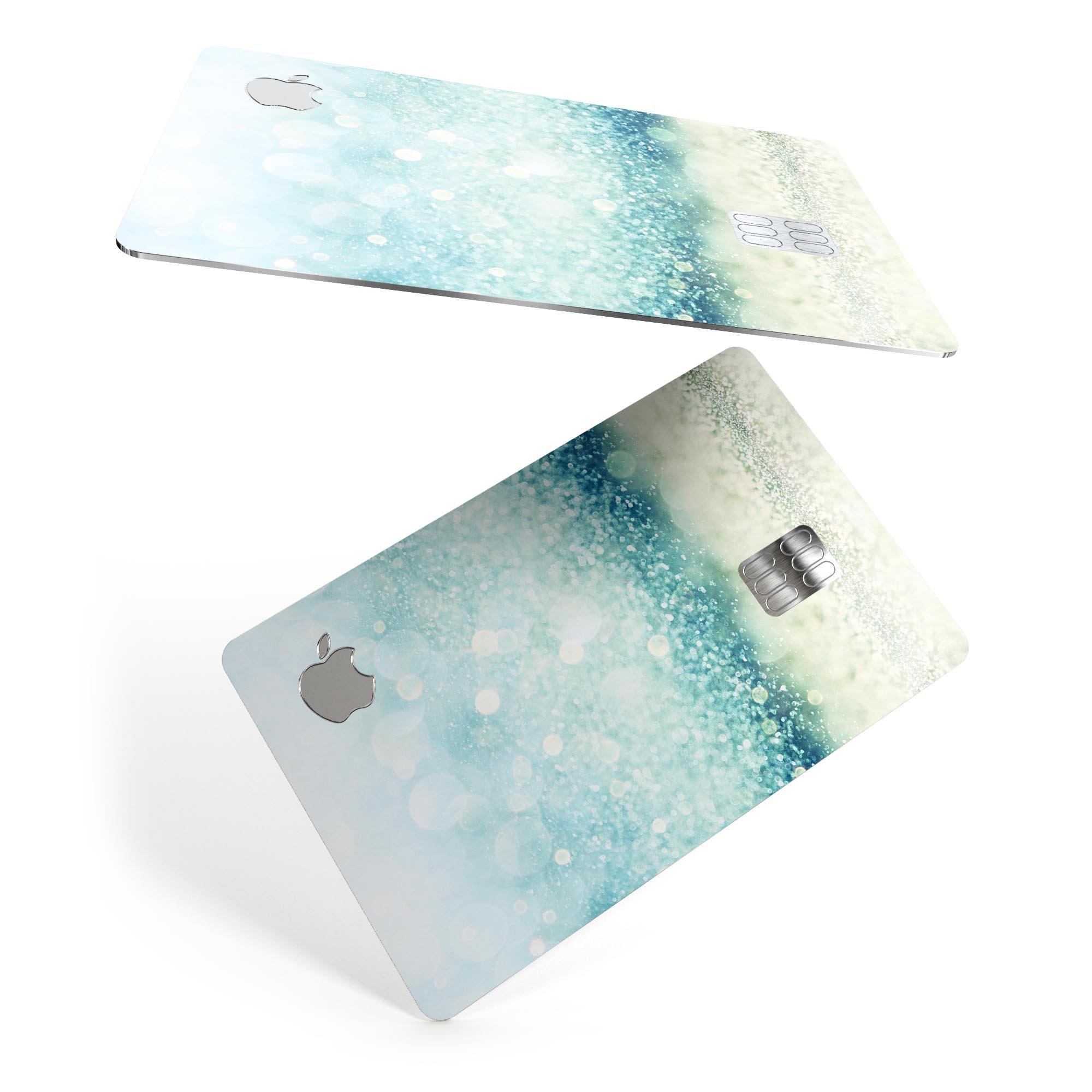 Teal and Aqua Unfocused Sparkling Orbs decal on an Apple Card, showcasing vibrant colors and a protective finish.