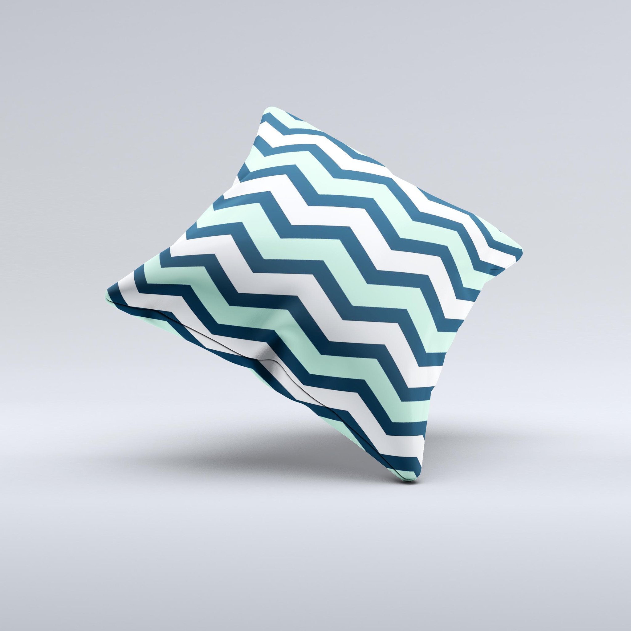 Teal and blue decorative throw pillow featuring a wide chevron pattern, handcrafted in Virginia with high-quality materials.