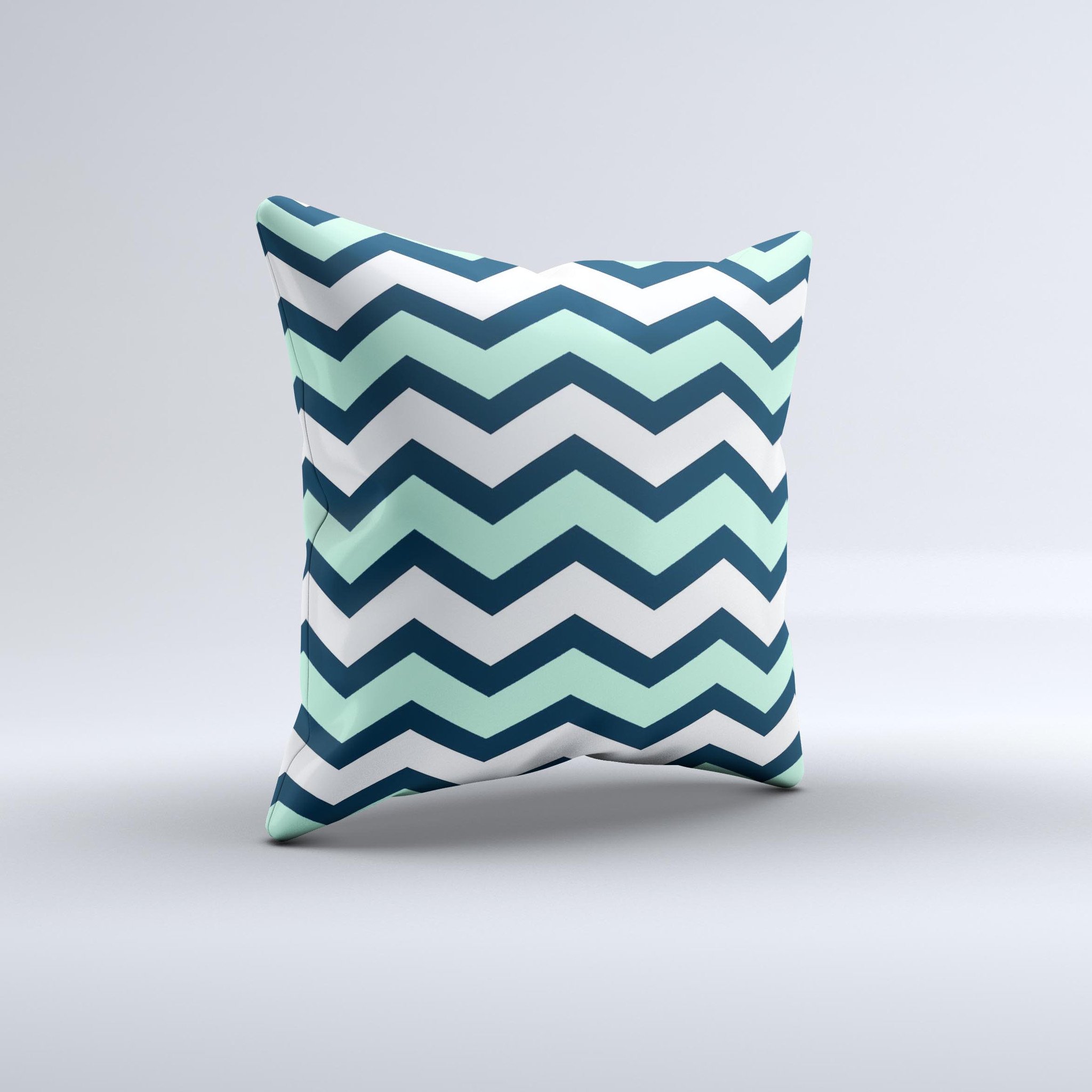 Teal and blue decorative throw pillow featuring a wide chevron pattern, handcrafted in Virginia with high-quality materials.