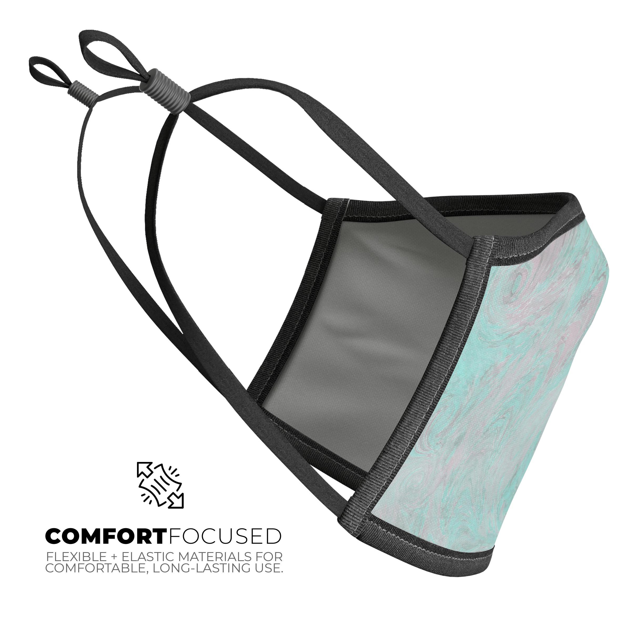 Teal Slate Marble Surface V23 mouth cover, showcasing a vibrant marble design with adjustable ear loops.