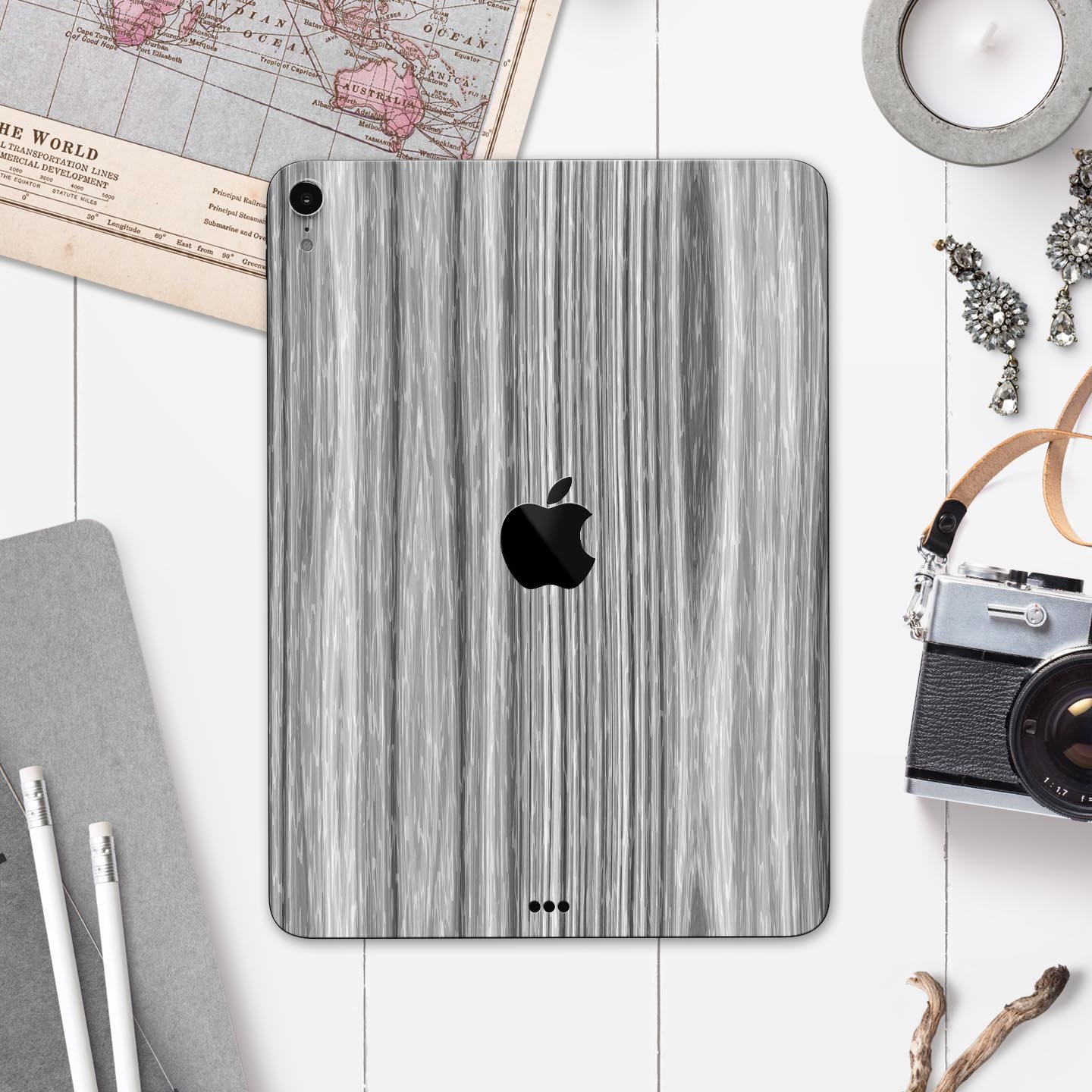 Textured Gray Dyed Surface skin decal for Apple iPad, showcasing its sleek design and premium 3M material.