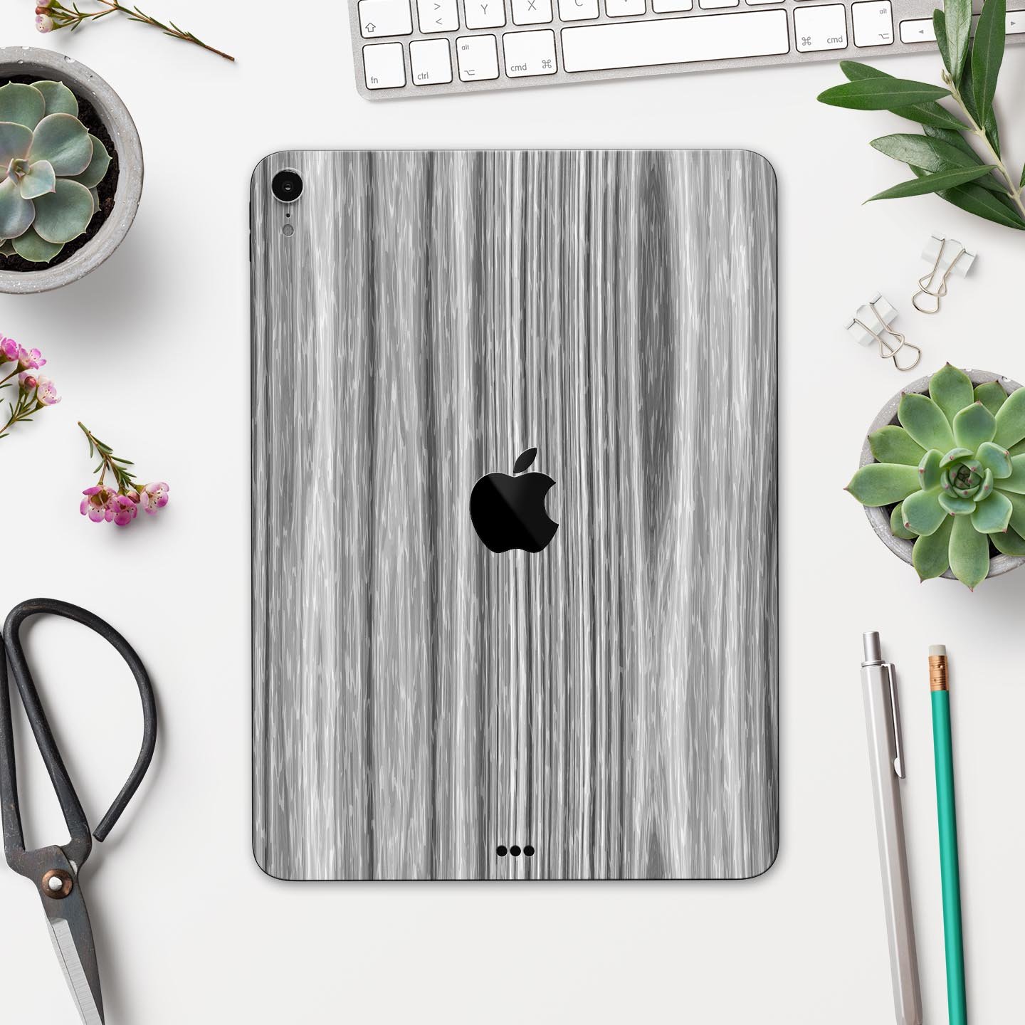 Textured Gray Dyed Surface skin decal for Apple iPad, showcasing its sleek design and premium 3M material.