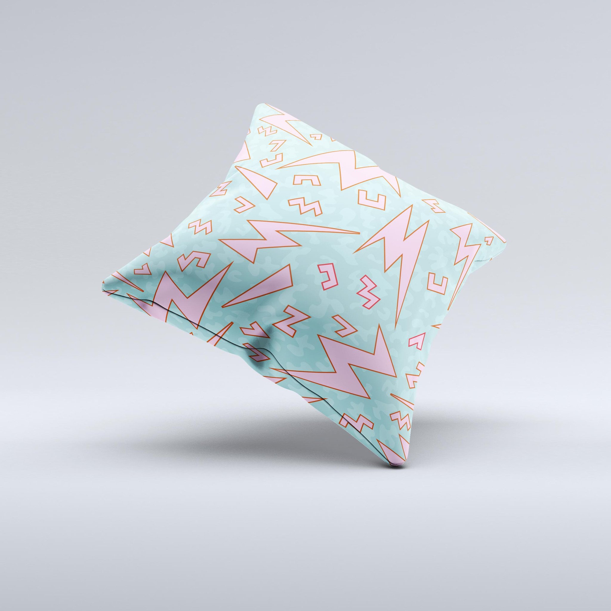A colorful 90's zig zag decorative throw pillow, handcrafted in Virginia with a unique design and high-quality fabric.