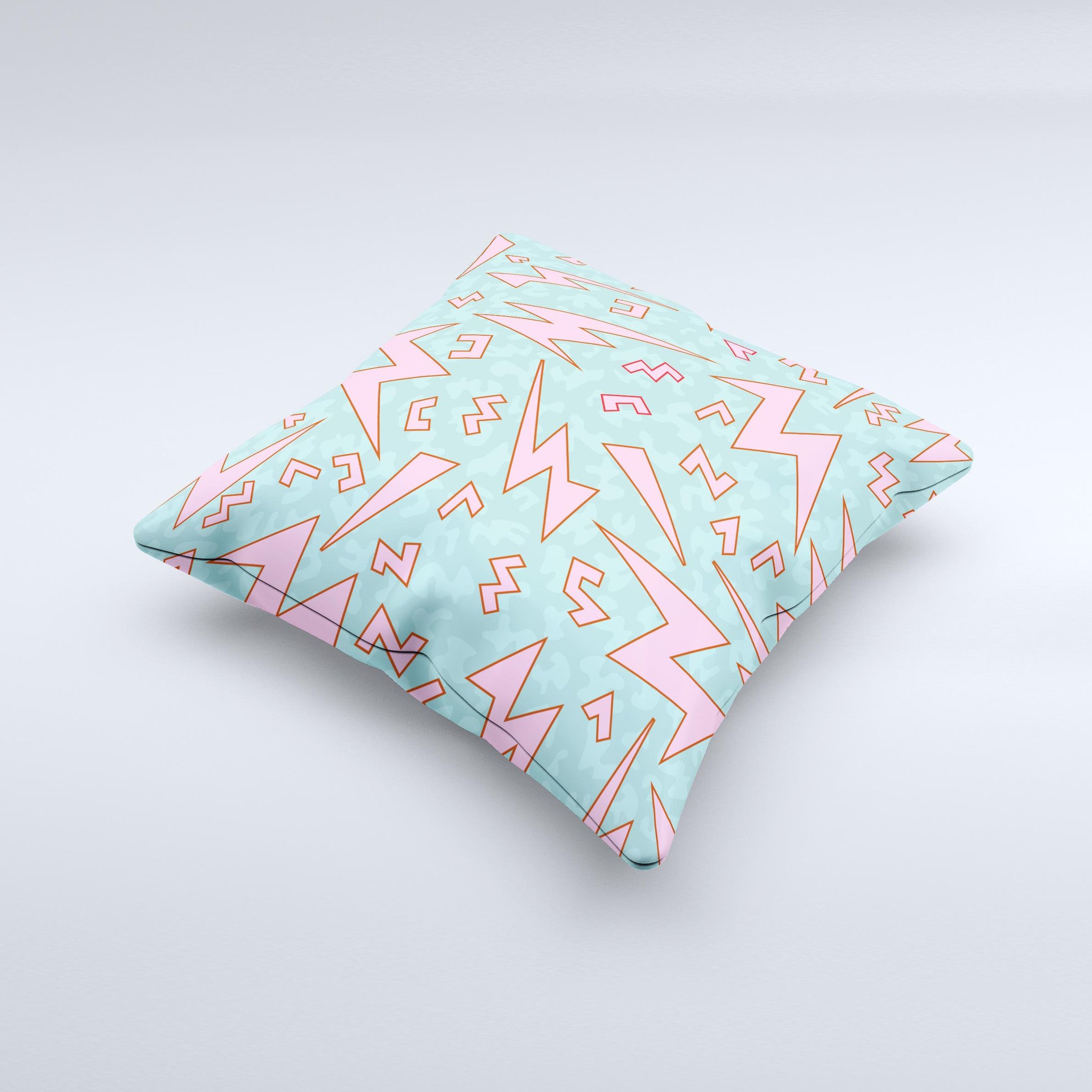 A colorful 90's zig zag decorative throw pillow, handcrafted in Virginia with a unique design and high-quality fabric.