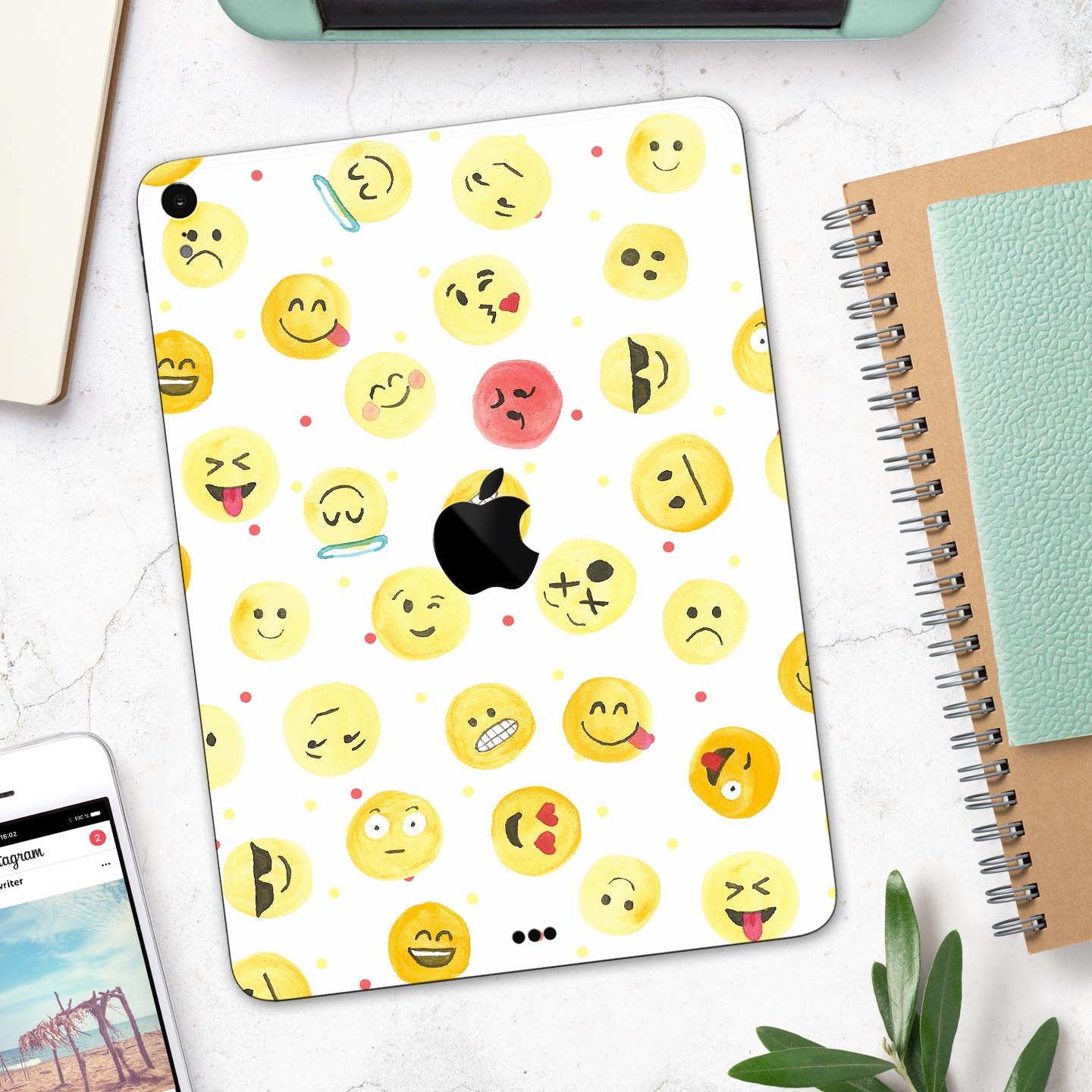 Full body skin decal featuring a colorful all-over emoji pattern designed for Apple iPad, showcasing vibrant graphics and a sleek finish.