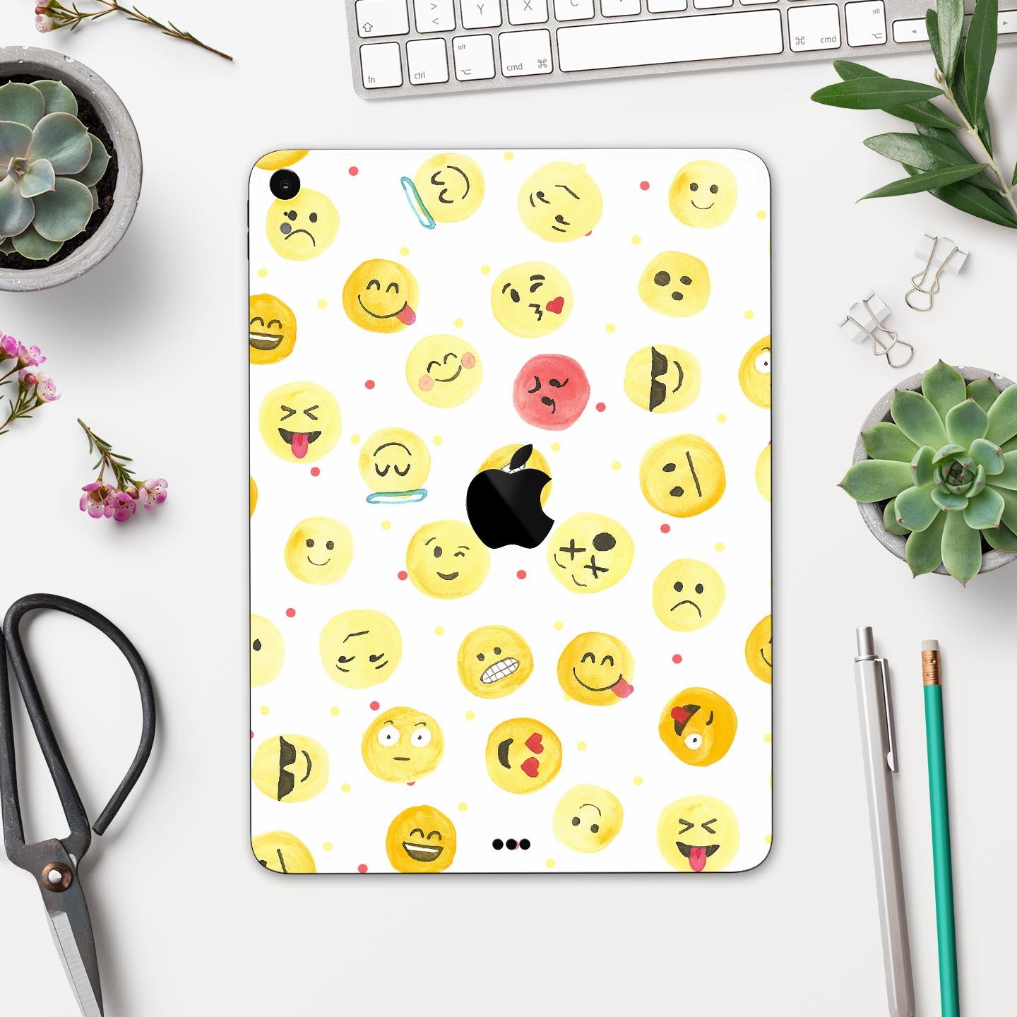 Full body skin decal featuring a colorful all-over emoji pattern designed for Apple iPad, showcasing vibrant graphics and a sleek finish.