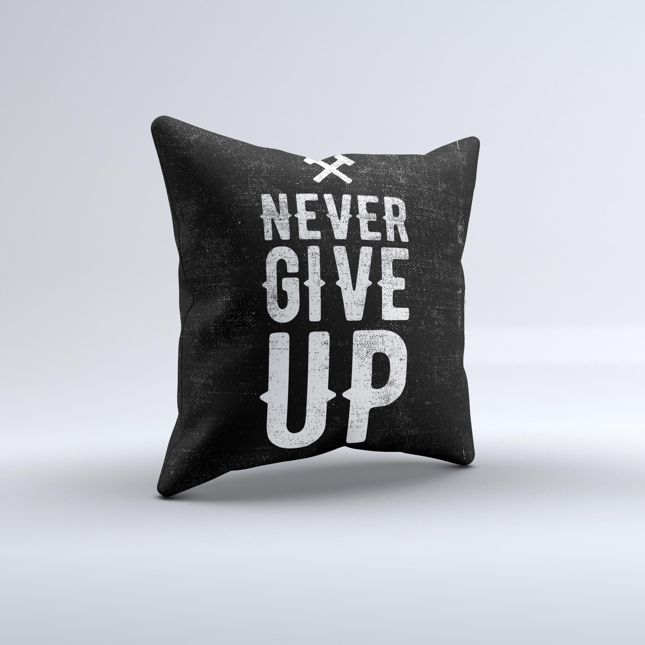 Black Hammered Never Give Up ink-Fuzed Decorative Throw Pillow showcasing a unique design with a motivational message, handcrafted in Virginia.