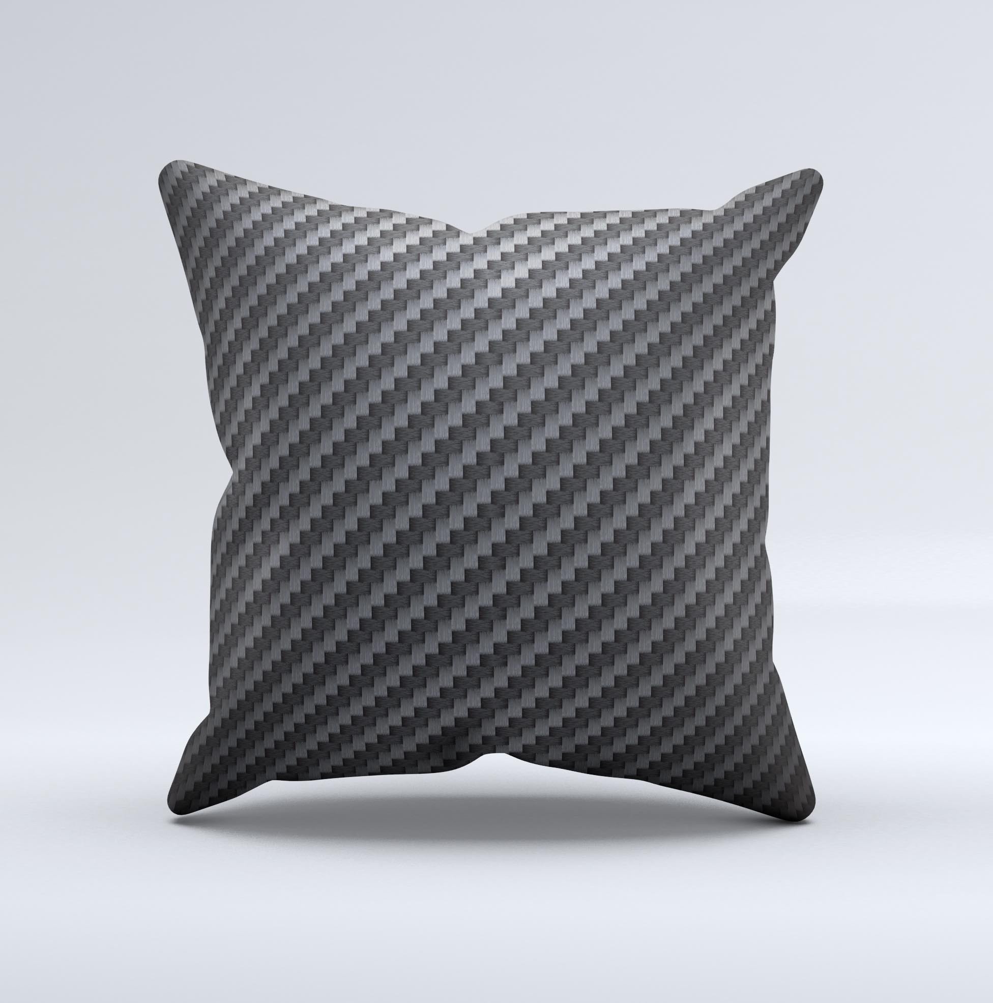 A decorative throw pillow featuring a carbon fiber texture design, showcasing its unique handmade quality and high thread count fabric.