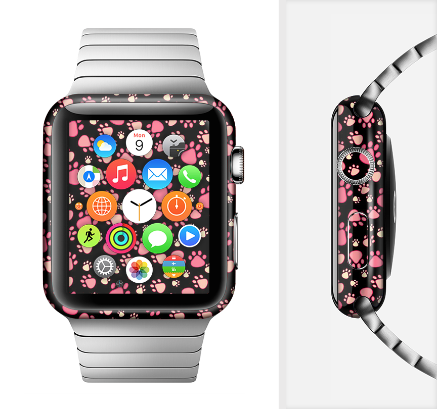 The Cut Pink Paw Prints Full-Body Skin Kit for Apple Watch featuring a vibrant pink paw print design on a sleek vinyl surface.