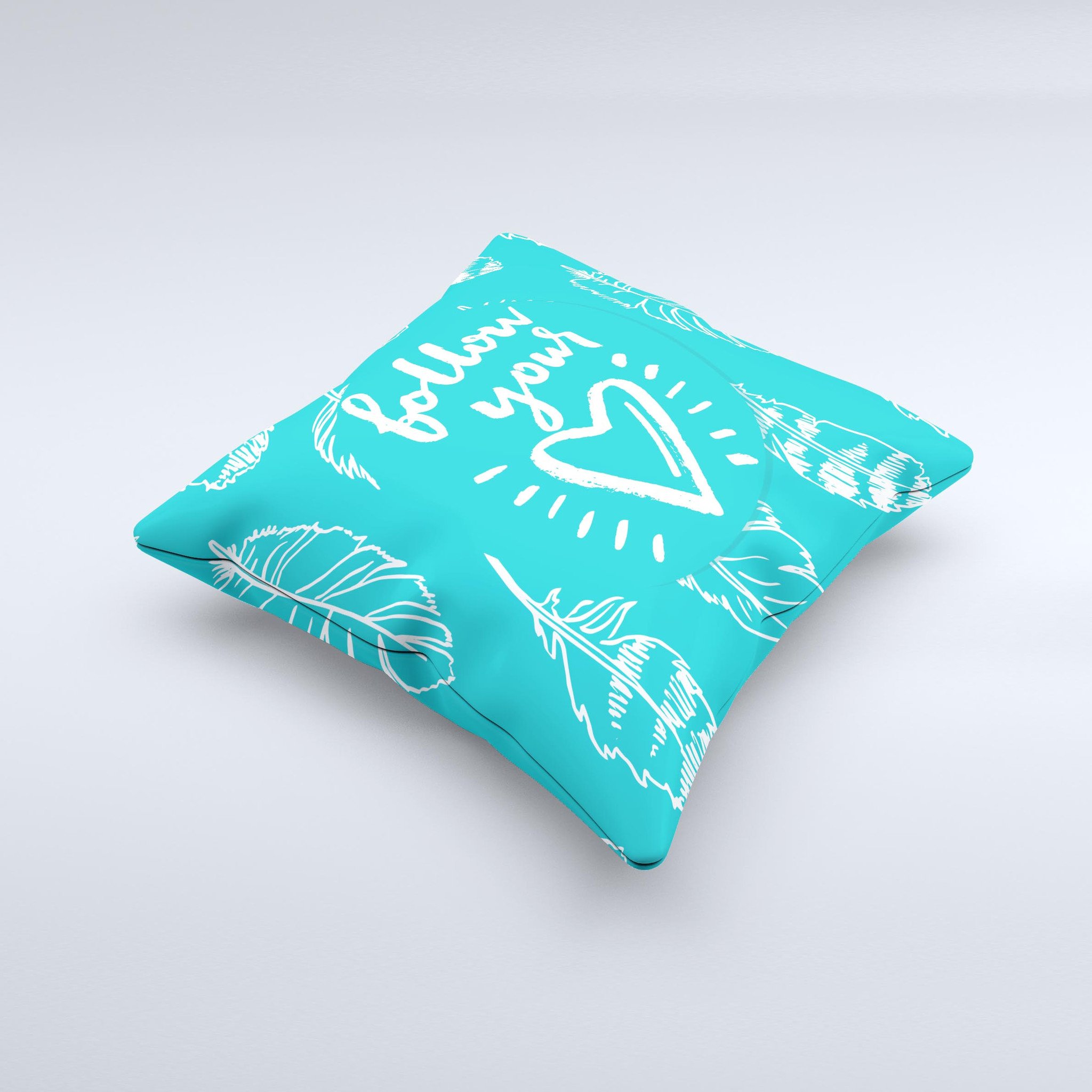 A beautifully crafted Follow Your Heart Feathers ink-Fuzed Decorative Throw Pillow featuring unique designs and high-quality fabric, perfect for home decor.