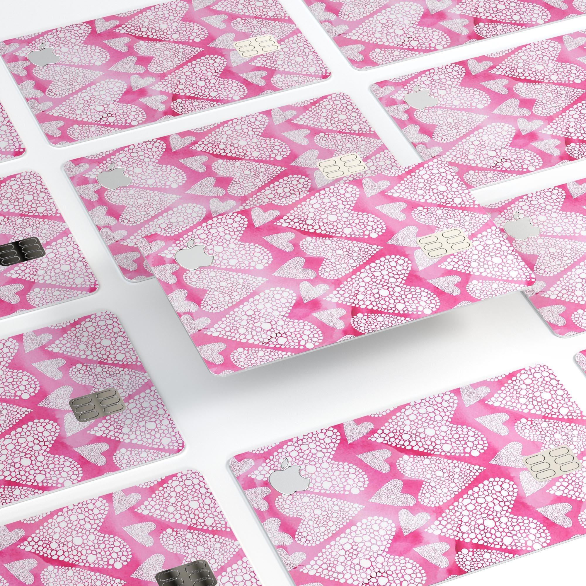 The Pink Watercolor Mosaic Hearts decal skin for Apple Card, showcasing vibrant heart patterns on a protective vinyl layer.