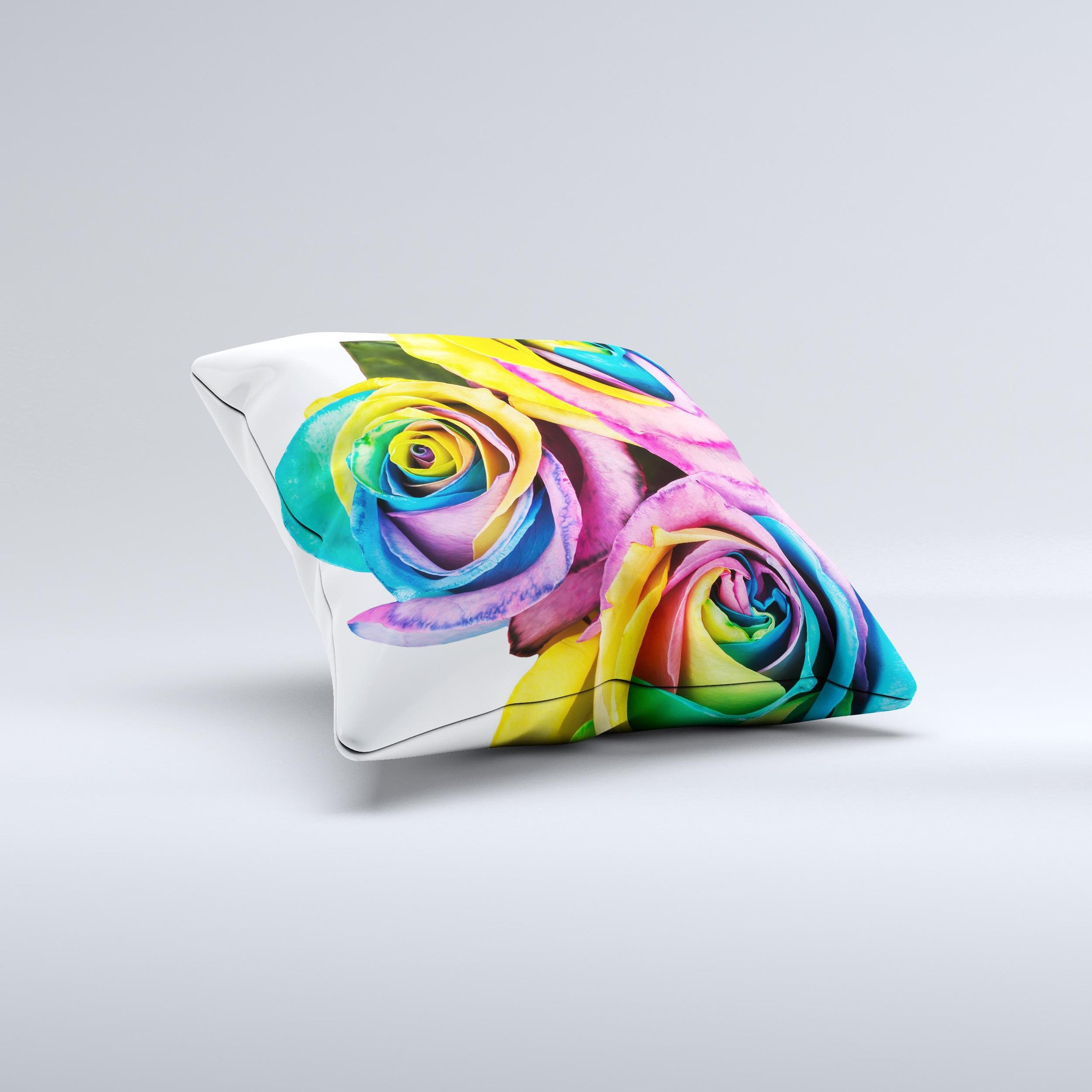 A vibrant decorative throw pillow featuring rainbow dyed roses, handcrafted in Virginia with a high thread count fabric.
