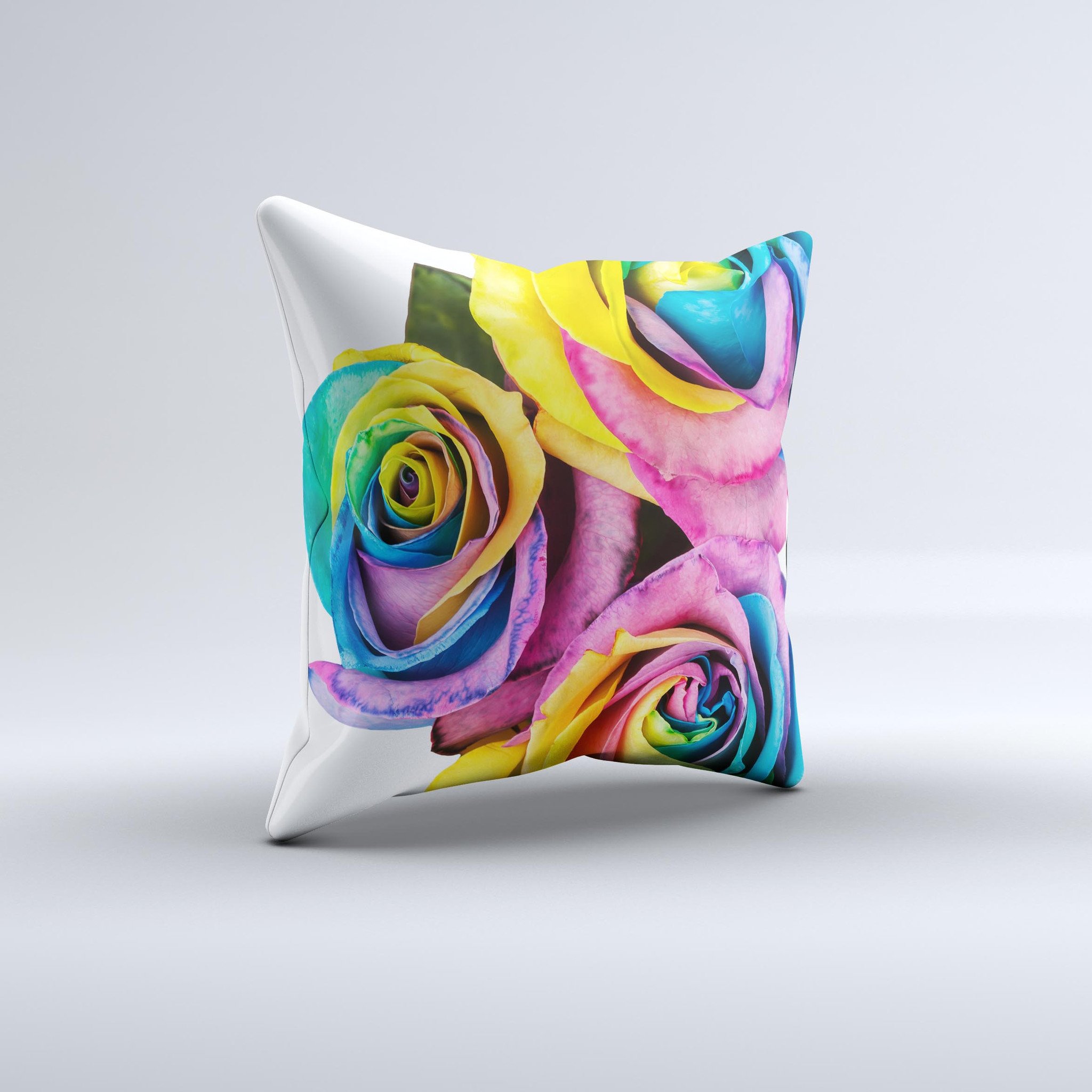 A vibrant decorative throw pillow featuring rainbow dyed roses, handcrafted in Virginia with a high thread count fabric.