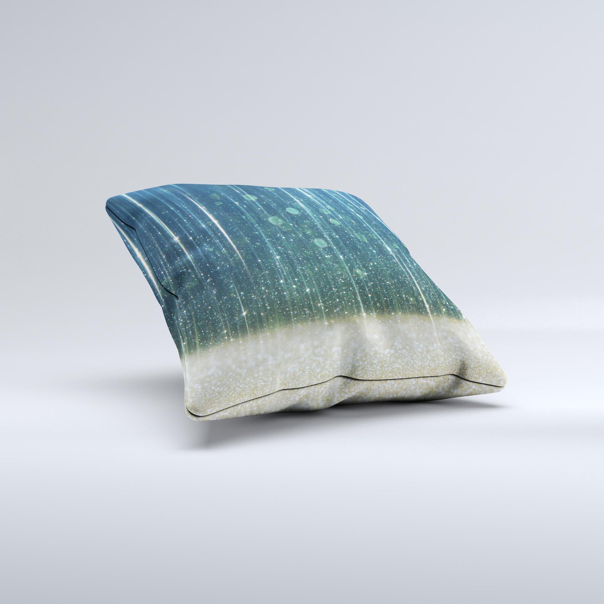 A handcrafted decorative throw pillow featuring a scratched blue and gold design, showcasing unique patterns and textures.